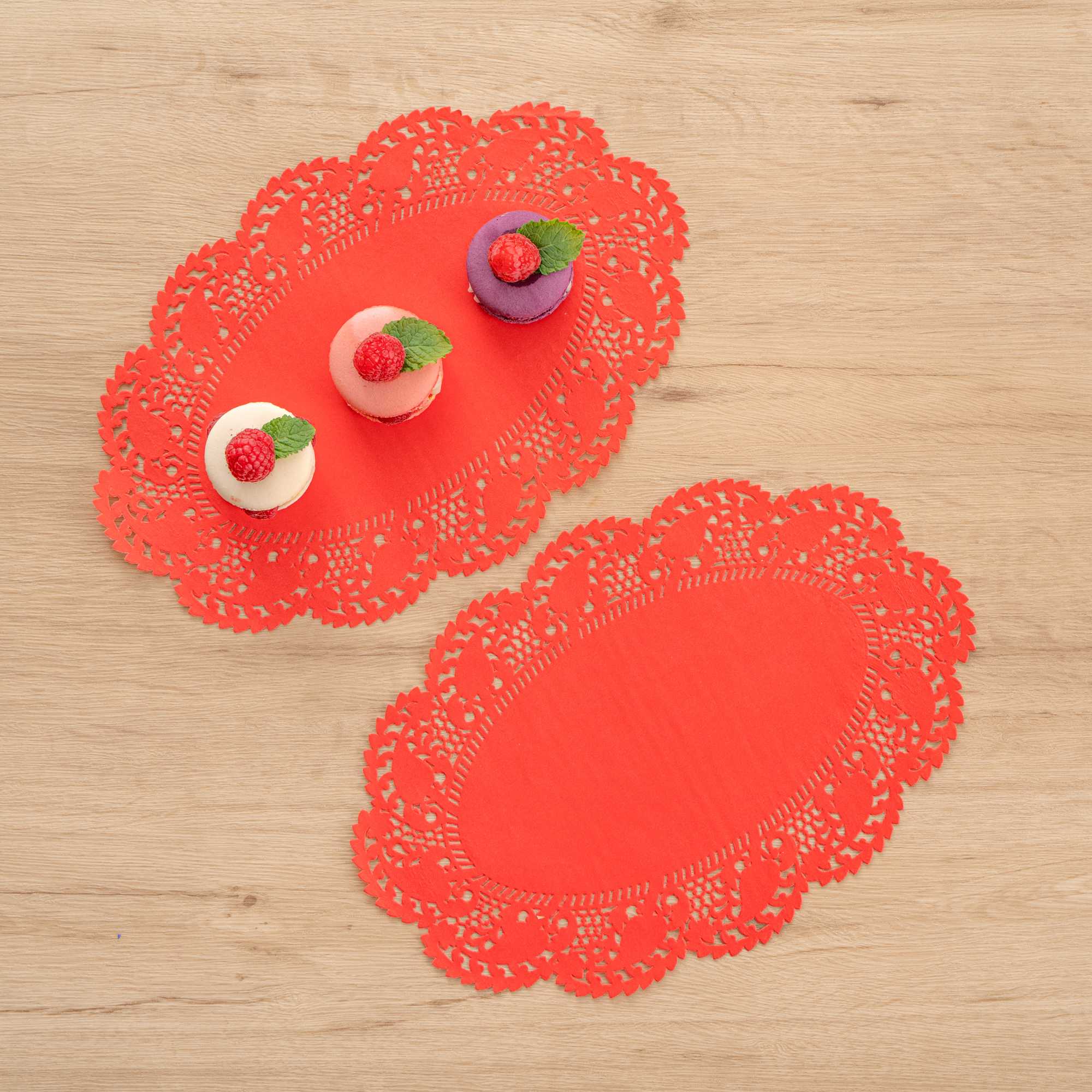 Pastry Tek Oval Red Paper Doilies - Lace - 12 1/2" x 8 1/2" - 100 count box