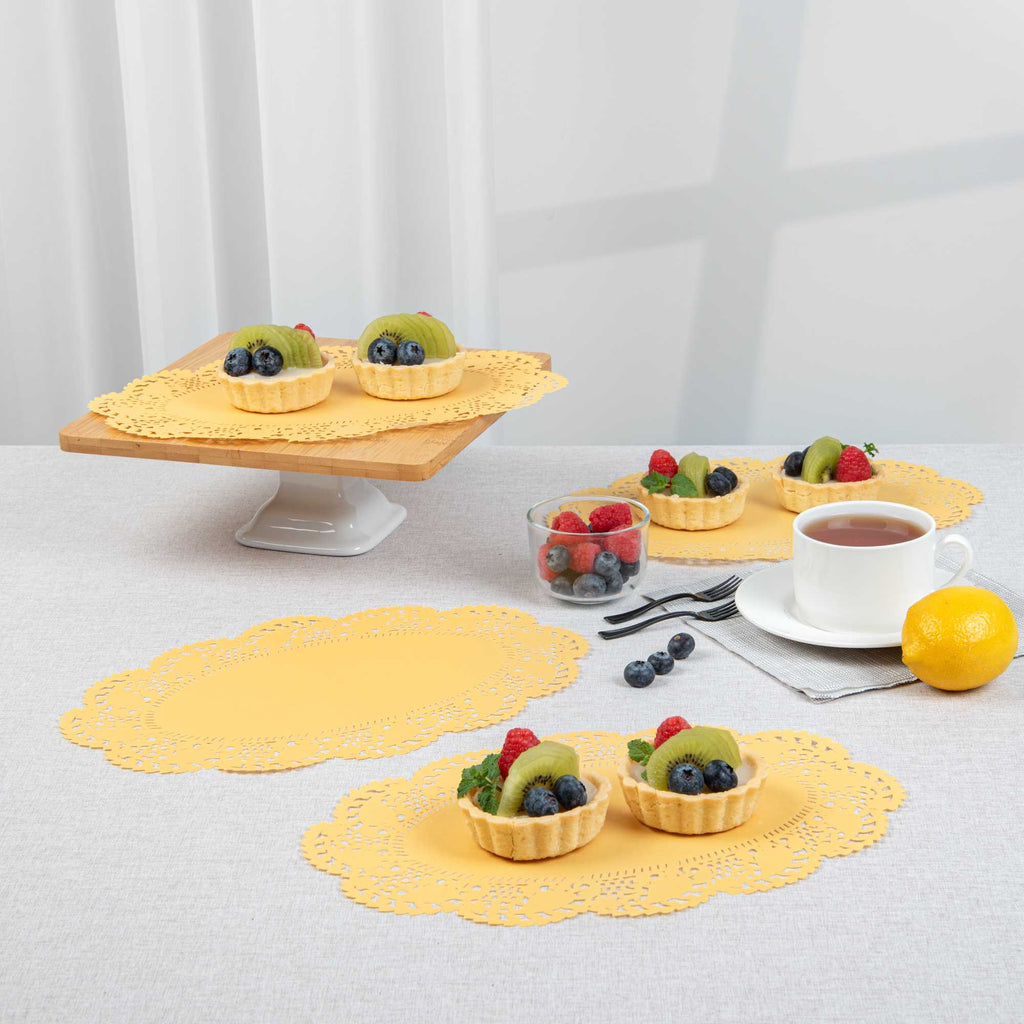 Pastry Tek Oval Orange Paper Doilies - Lace - 12 1/2" x 8 1/2" - 100 count box
