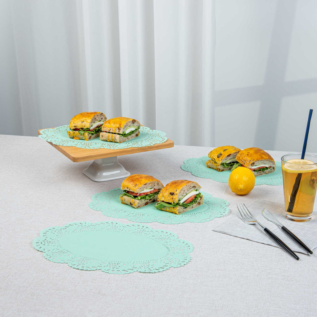 Pastry Tek Oval Teal Paper Doilies - Lace - 12 1/2" x 8 1/2" - 100 count box