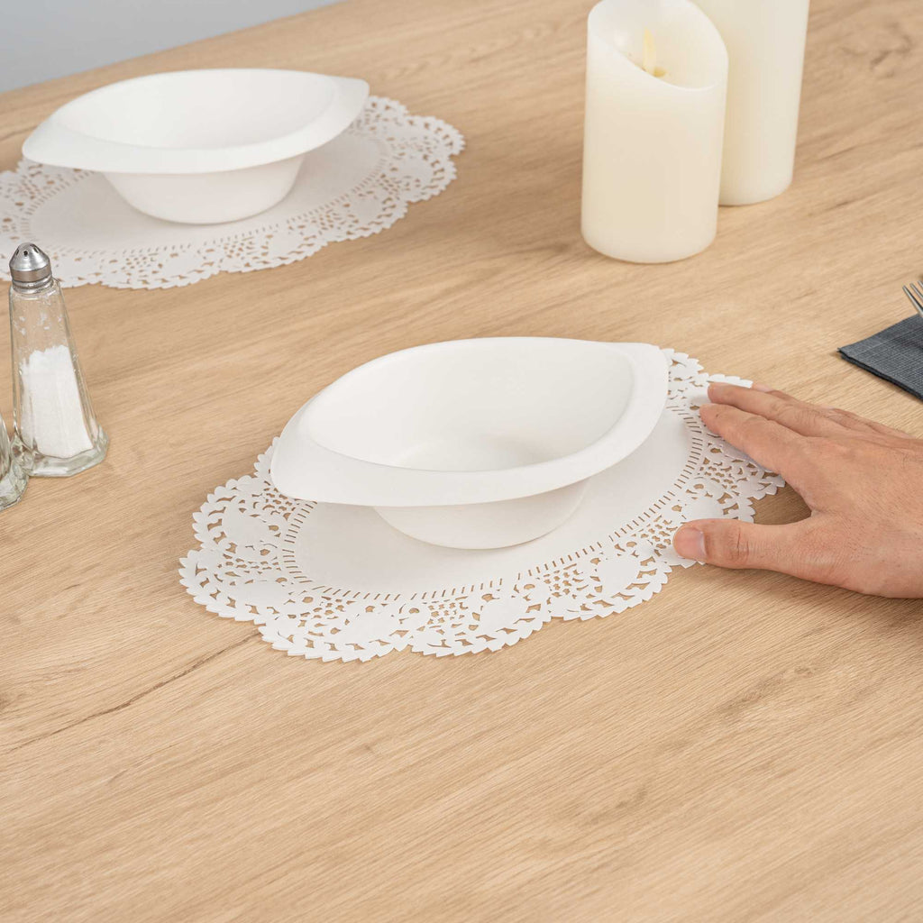 Pastry Tek Oval White Paper Doilies - Lace - 12 1/2" x 8 1/2" - 100 count box