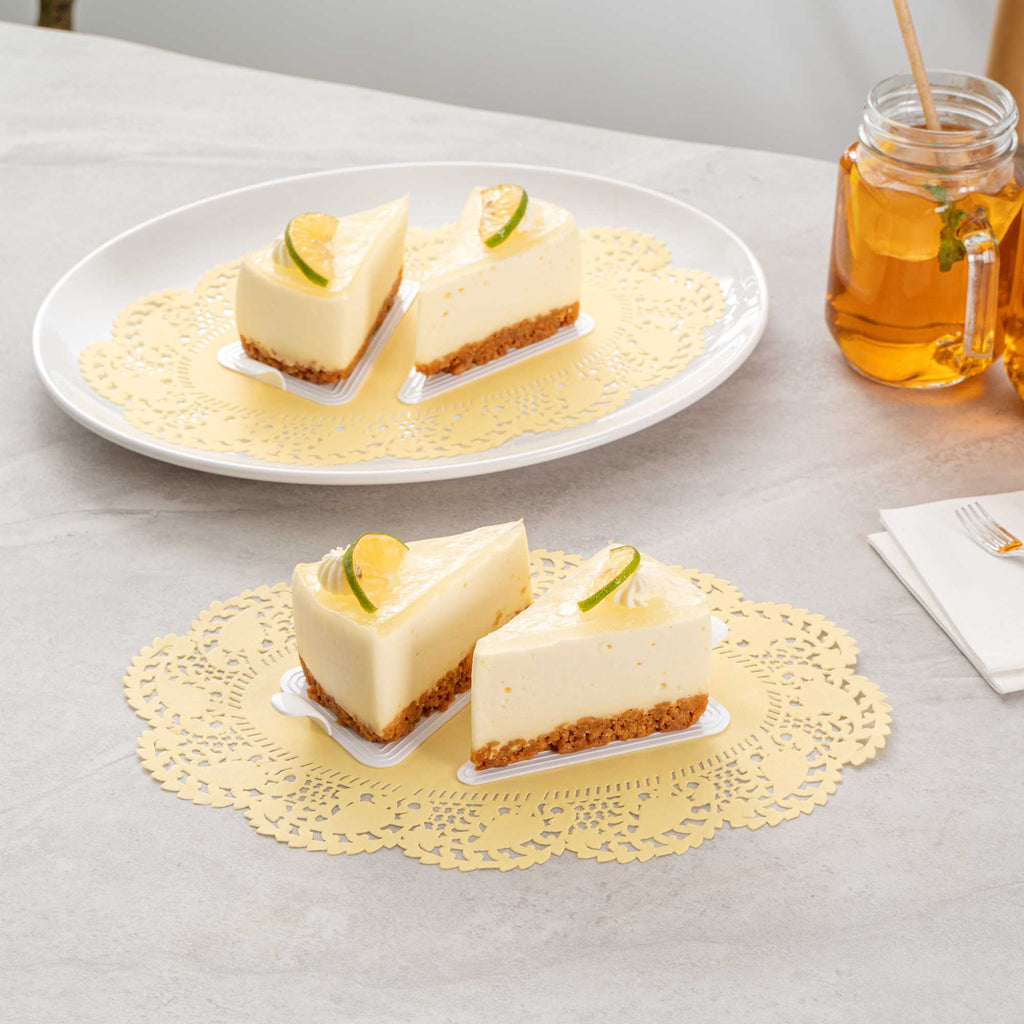 Pastry Tek Oval Yellow Paper Doilies - Lace - 12 1/2" x 8 1/2" - 100 count box