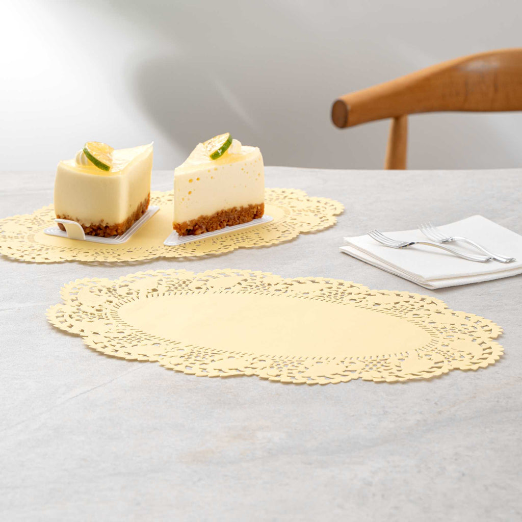 Pastry Tek Oval Yellow Paper Doilies - Lace - 12 1/2" x 8 1/2" - 100 count box