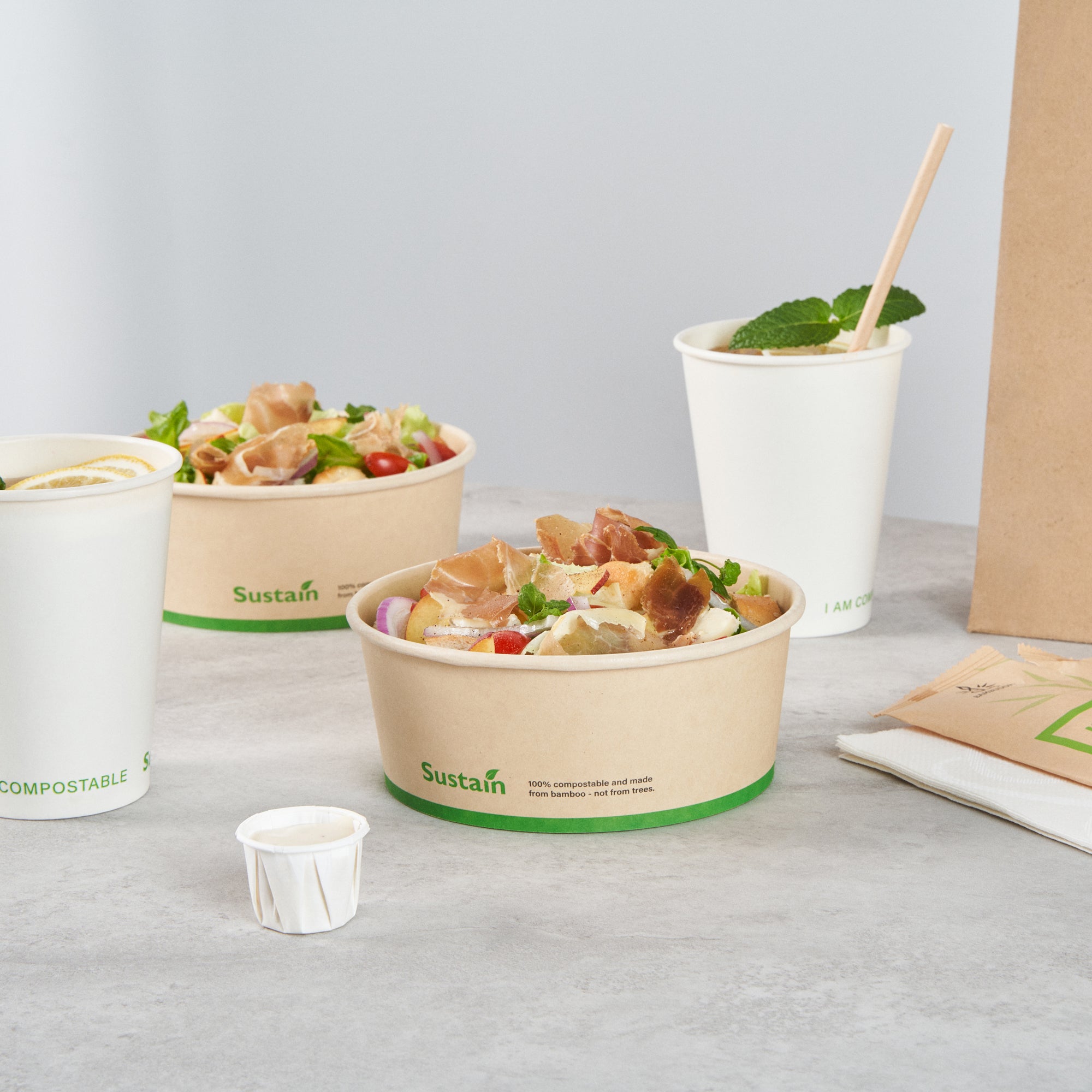 Sustain 25 oz Round Bamboo Paper Salad Container - with PLA Lining, Compostable - 6" x 6" x 2 1/2" - 50 count box