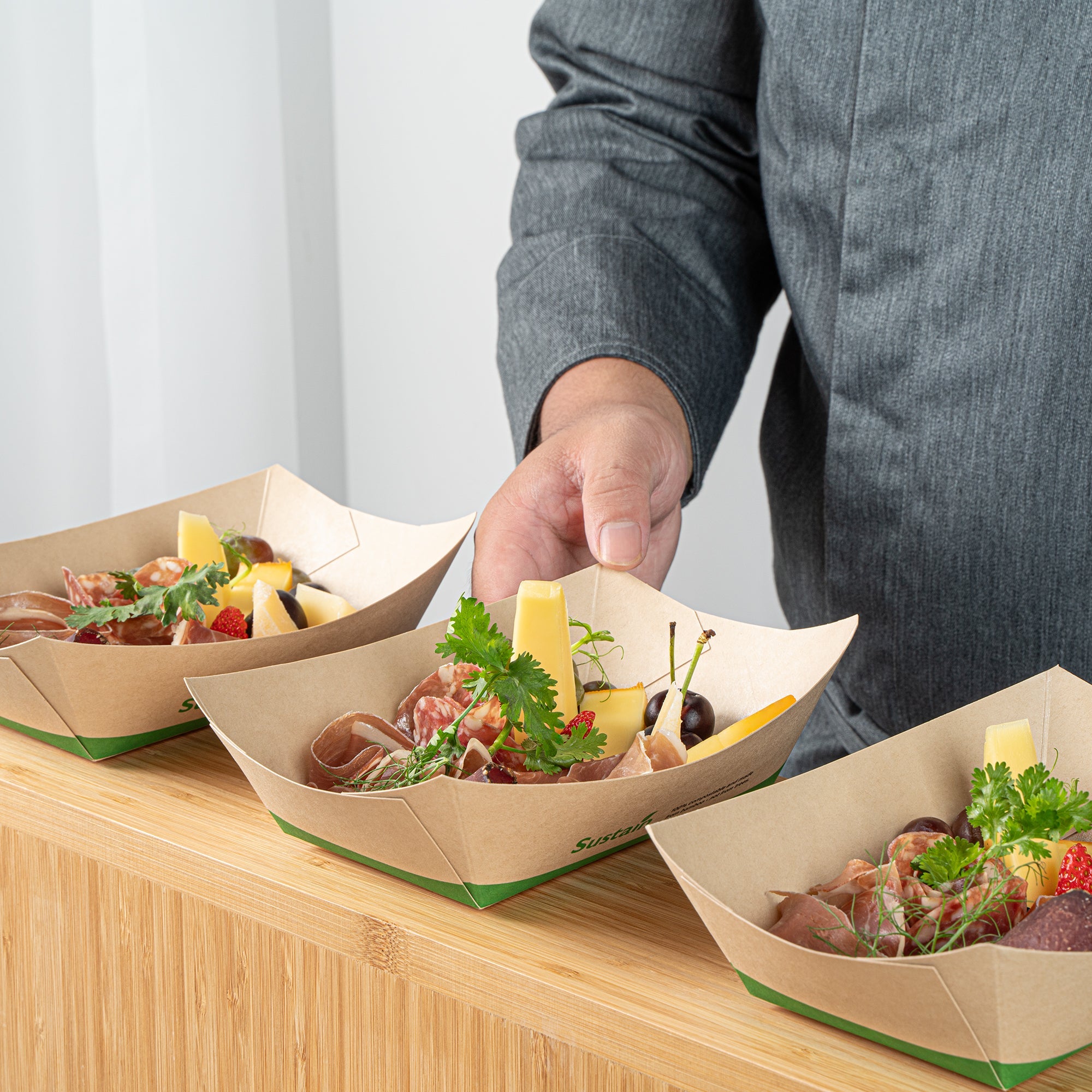 Sustain 1 lb Bamboo Paper #100 Food Tray / Boat - with PLA Lining, Compostable - 5 1/2" x 3 1/2" x 2" - 200 count box