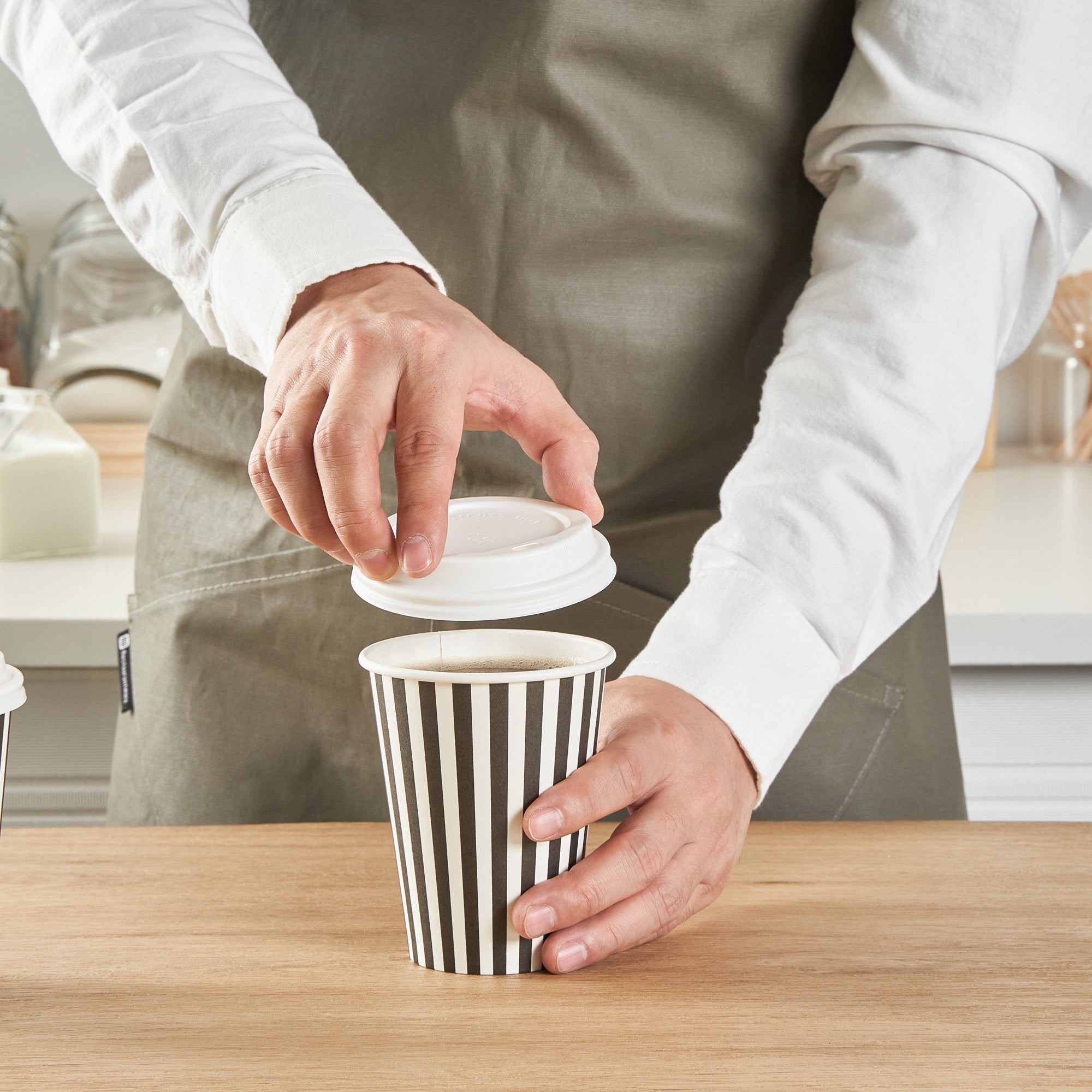 Restpresso 12 oz Black and White Stripe Paper Single Wall Coffee Cup - with White Lid - 3 1/2"x 3 1/2"x 4 3/4" - 20 count box