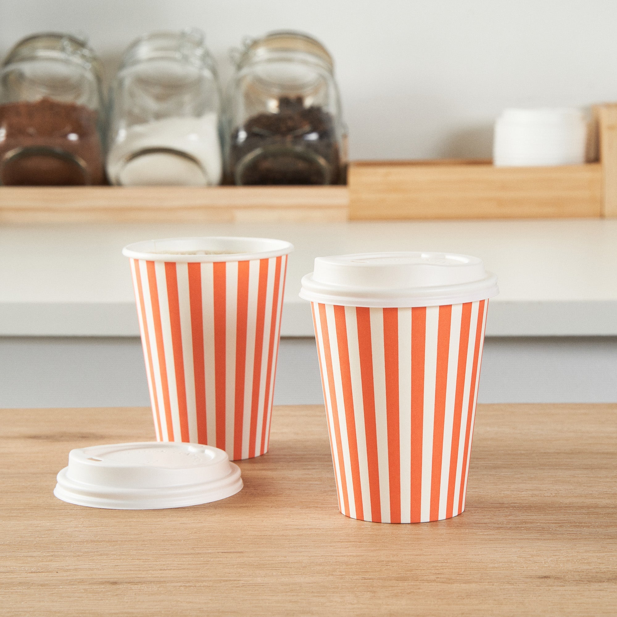 Restpresso 12 oz Orange and White Stripe Paper Single Wall Coffee Cup - with White Lid - 3 1/2"x 3 1/2"x 4 3/4" - 20 count box