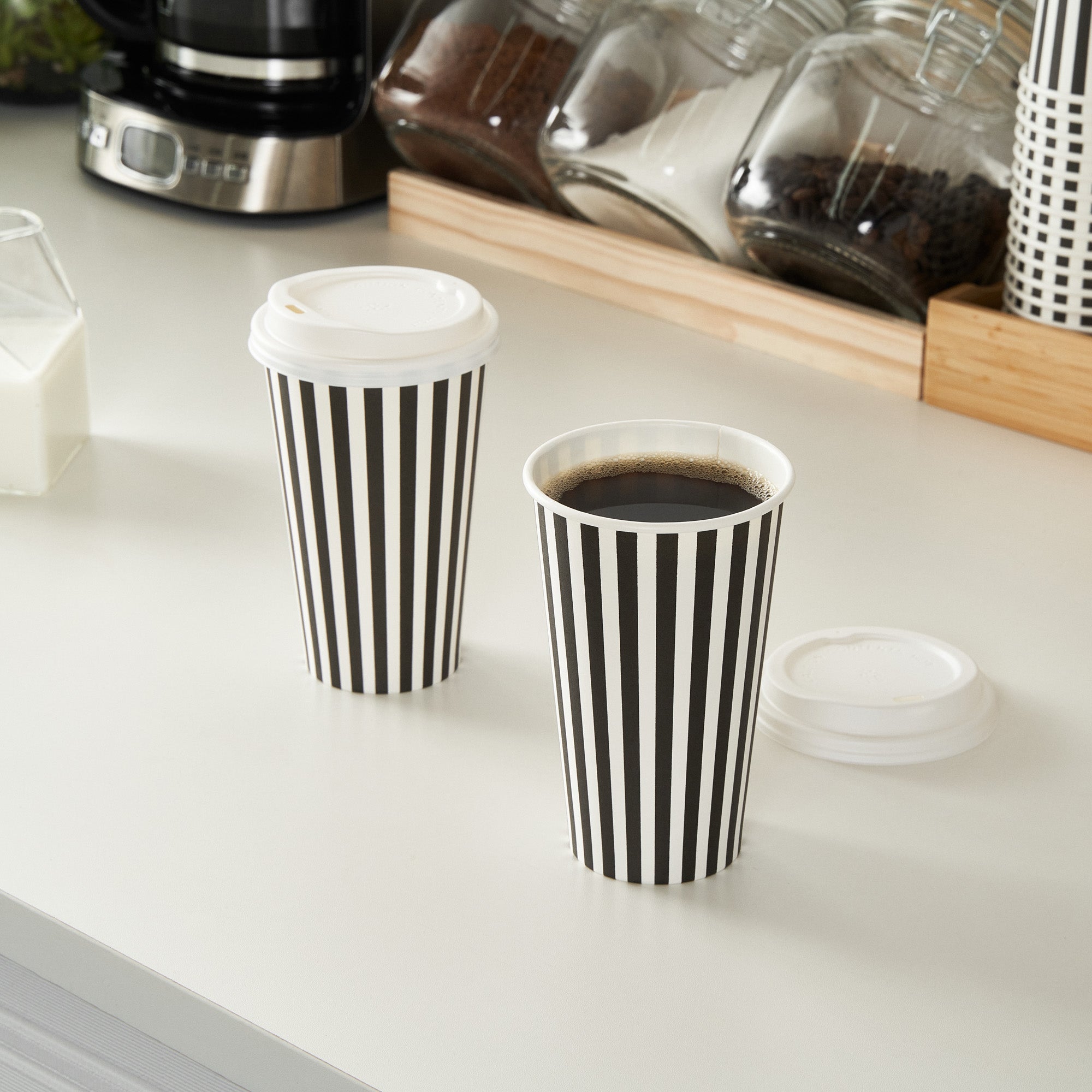 Restpresso 16 oz Black and White Stripe Paper Single Wall Coffee Cup - with White Lid - 3 1/2"x 3 1/2"x 5 3/4" - 20 count box