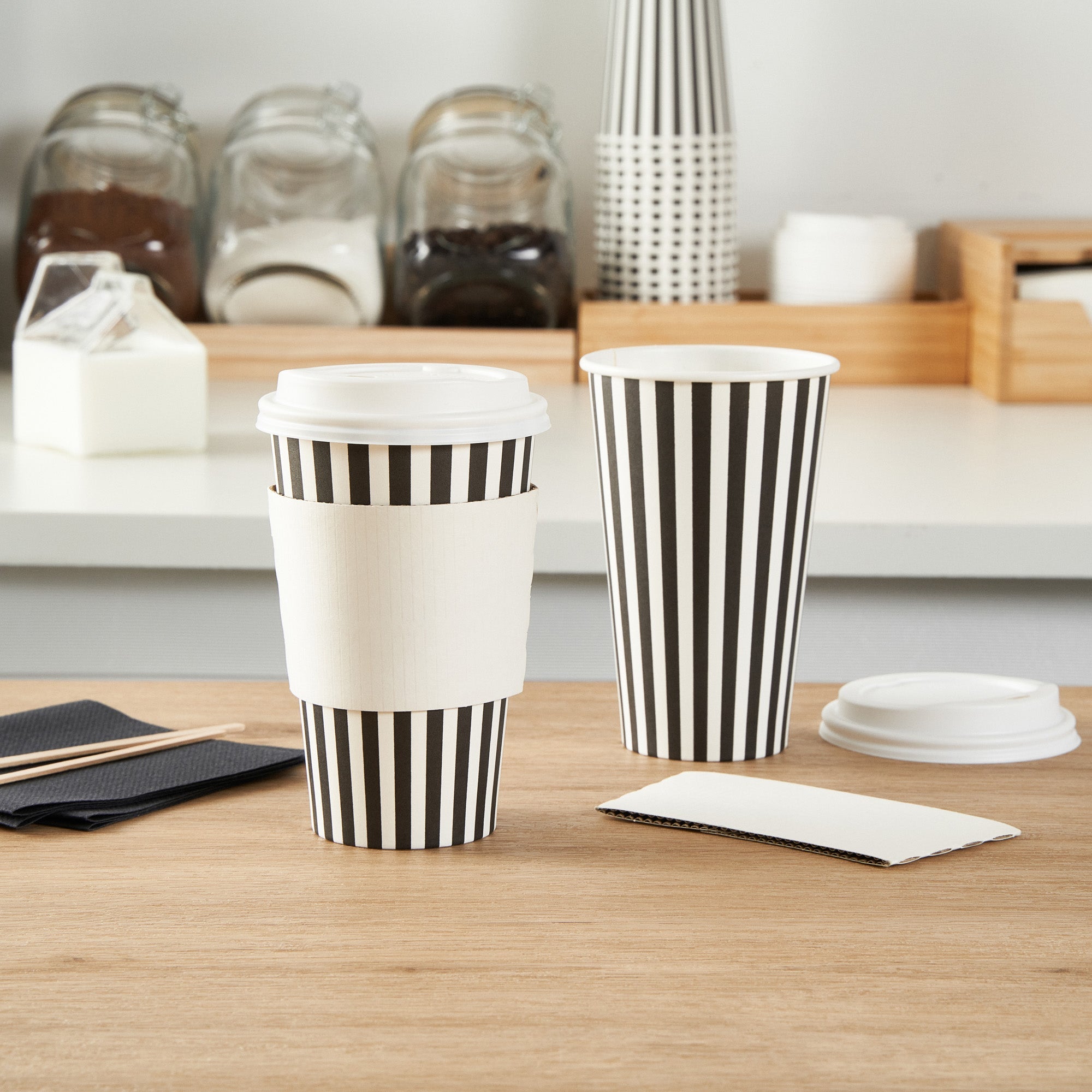 Restpresso 16 oz Black and White Stripe Paper Single Wall Coffee Cup - with White Lid - 3 1/2"x 3 1/2"x 5 3/4" - 20 count box