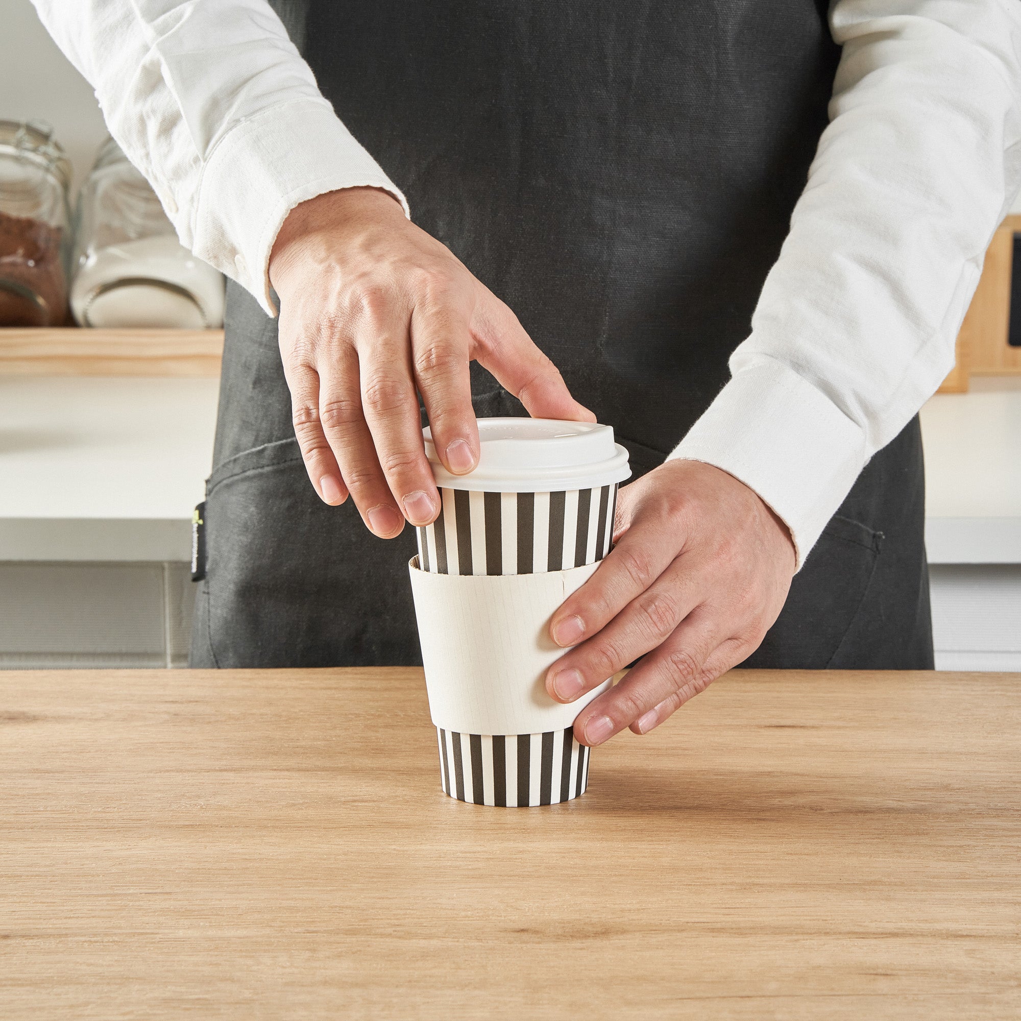 Restpresso 16 oz Black and White Stripe Paper Single Wall Coffee Cup - with White Lid - 3 1/2"x 3 1/2"x 5 3/4" - 20 count box