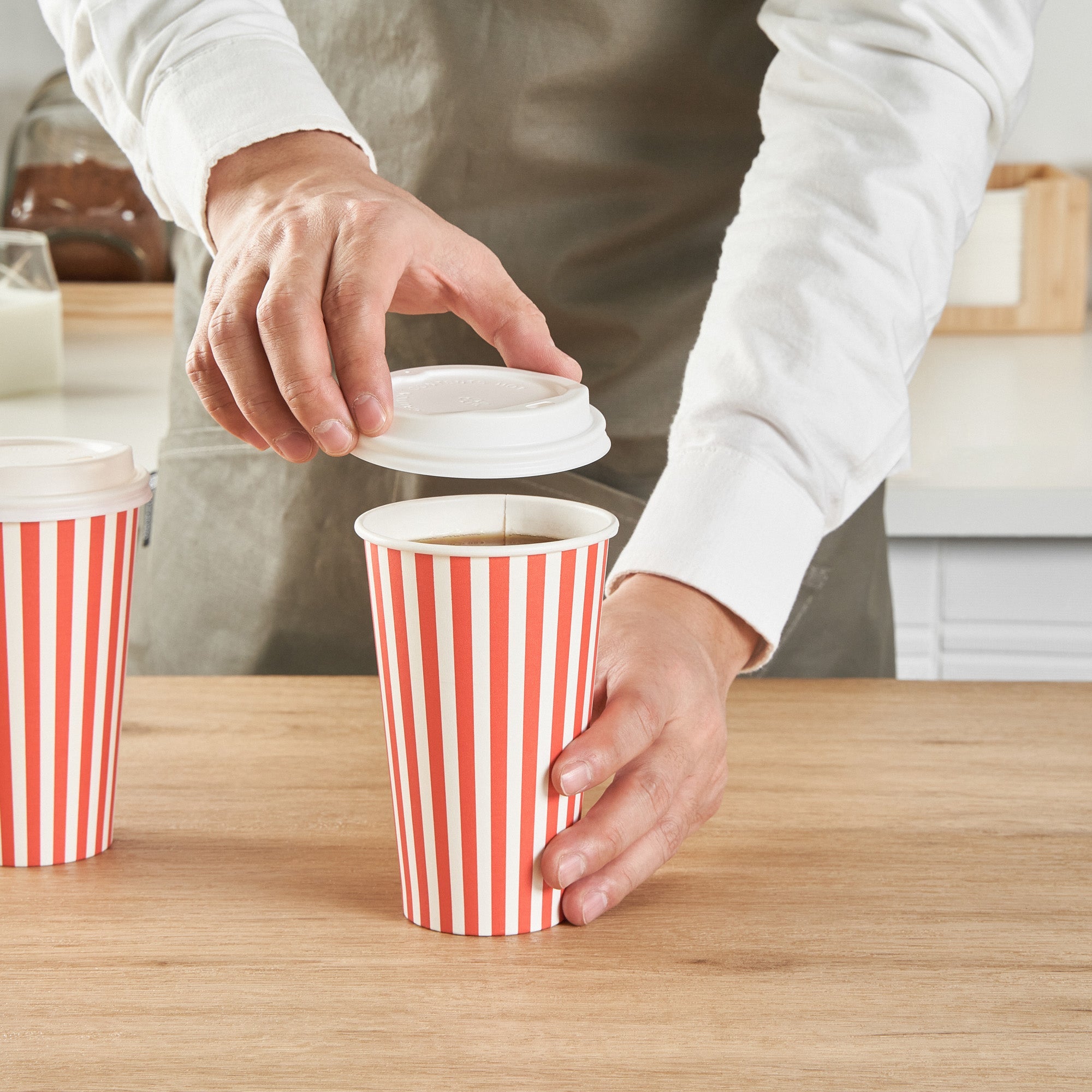 Restpresso 16 oz Red and White Stripe Paper Single Wall Coffee Cup - with White Lid - 3 1/2"x 3 1/2"x 5 3/4" - 20 count box
