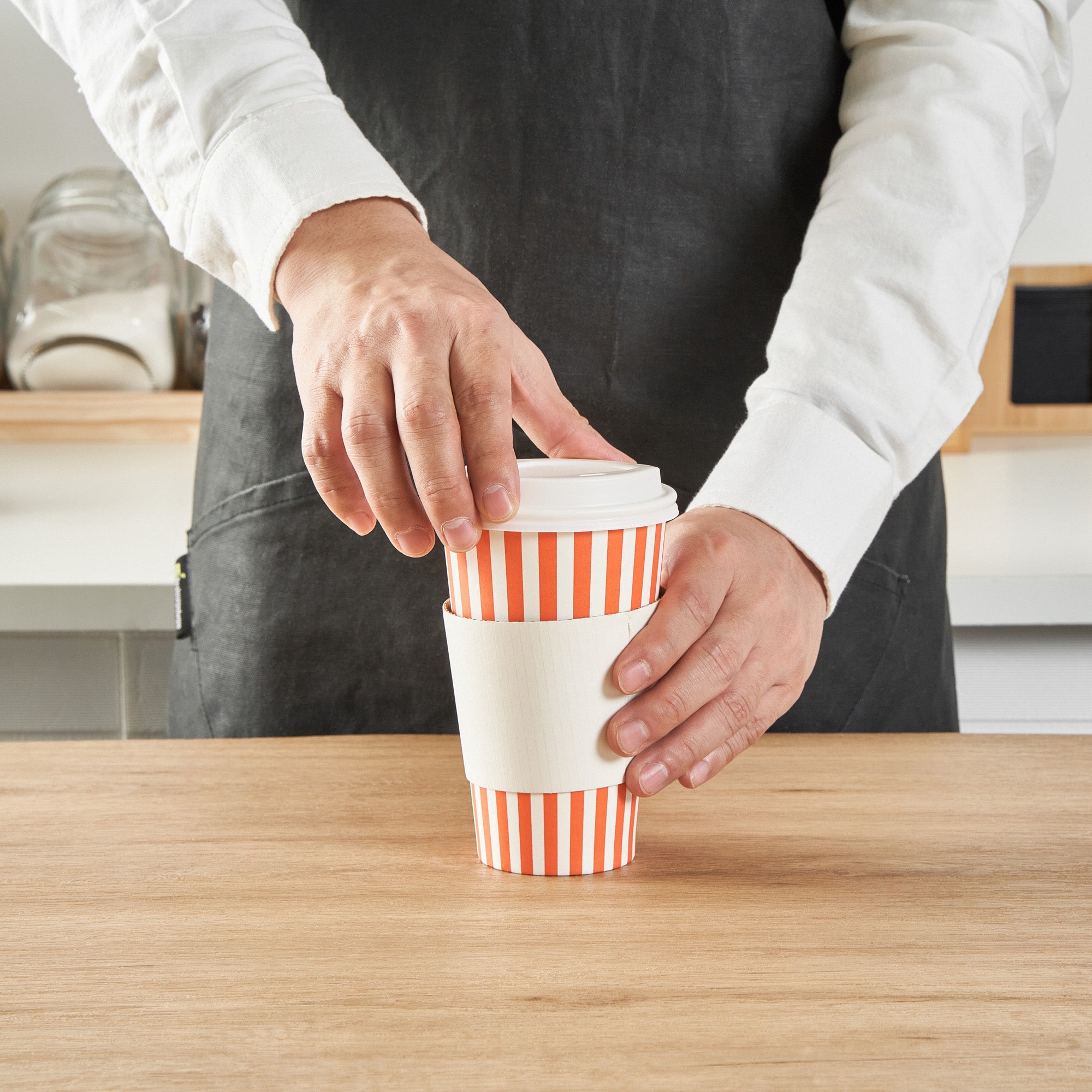 Restpresso 16 oz Orange and White Stripe Paper Single Wall Coffee Cup - with White Lid - 3 1/2"x 3 1/2"x 5 3/4" - 400 count box