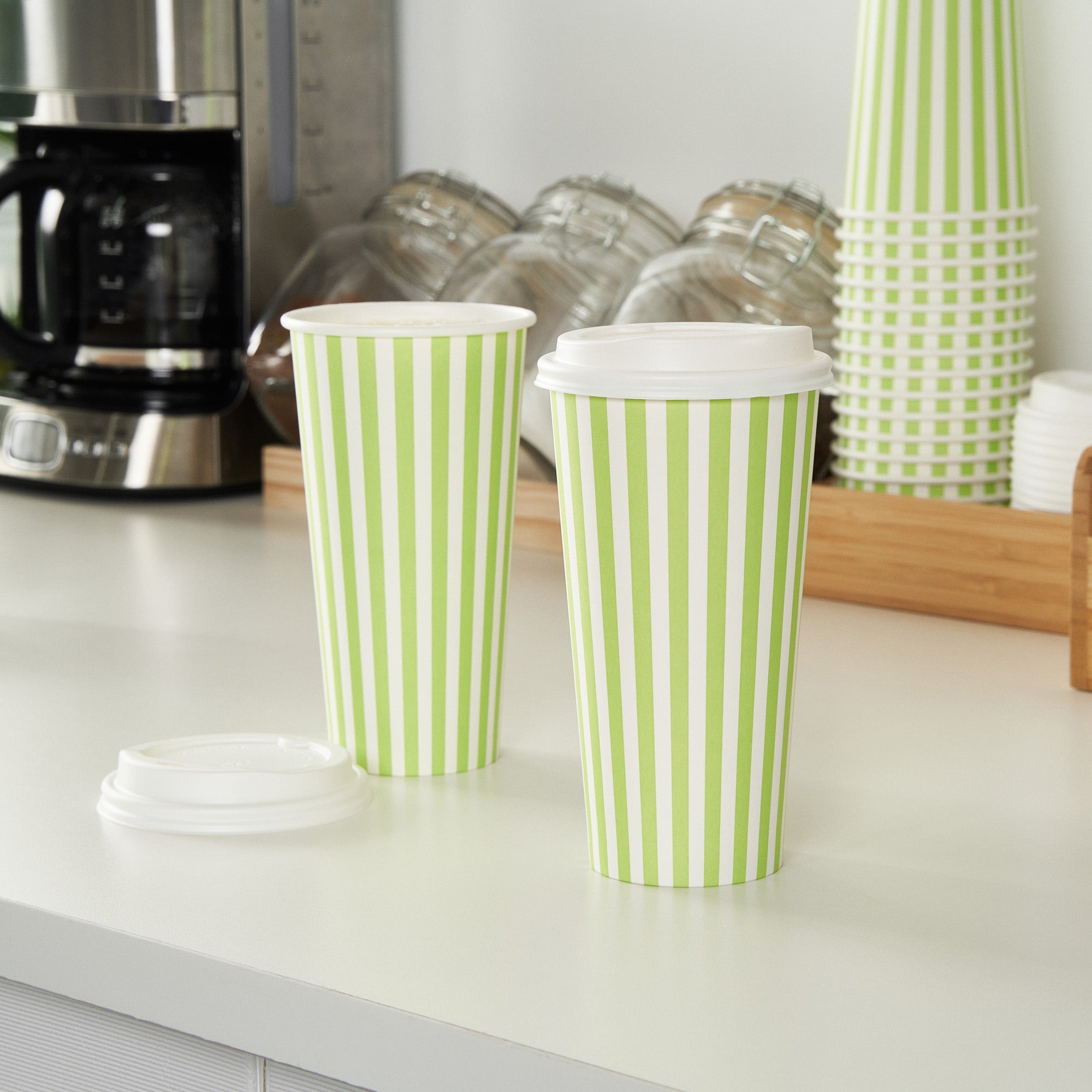 Restpresso 20 oz Green and White Stripe Paper Single Wall Coffee Cup - with White Lid - 3 1/2"x 3 1/2"x 6 1/2" - 20 count box