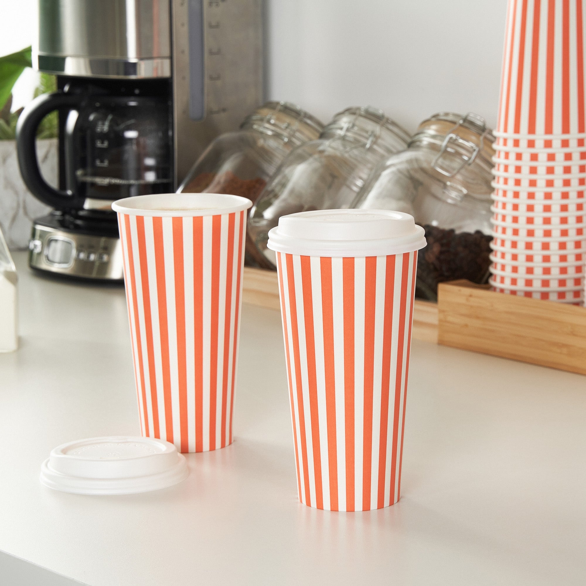 Restpresso 20 oz Orange and White Stripe Paper Single Wall Coffee Cup - with White Lid - 3 1/2"x 3 1/2"x 6 1/2" - 20 count box