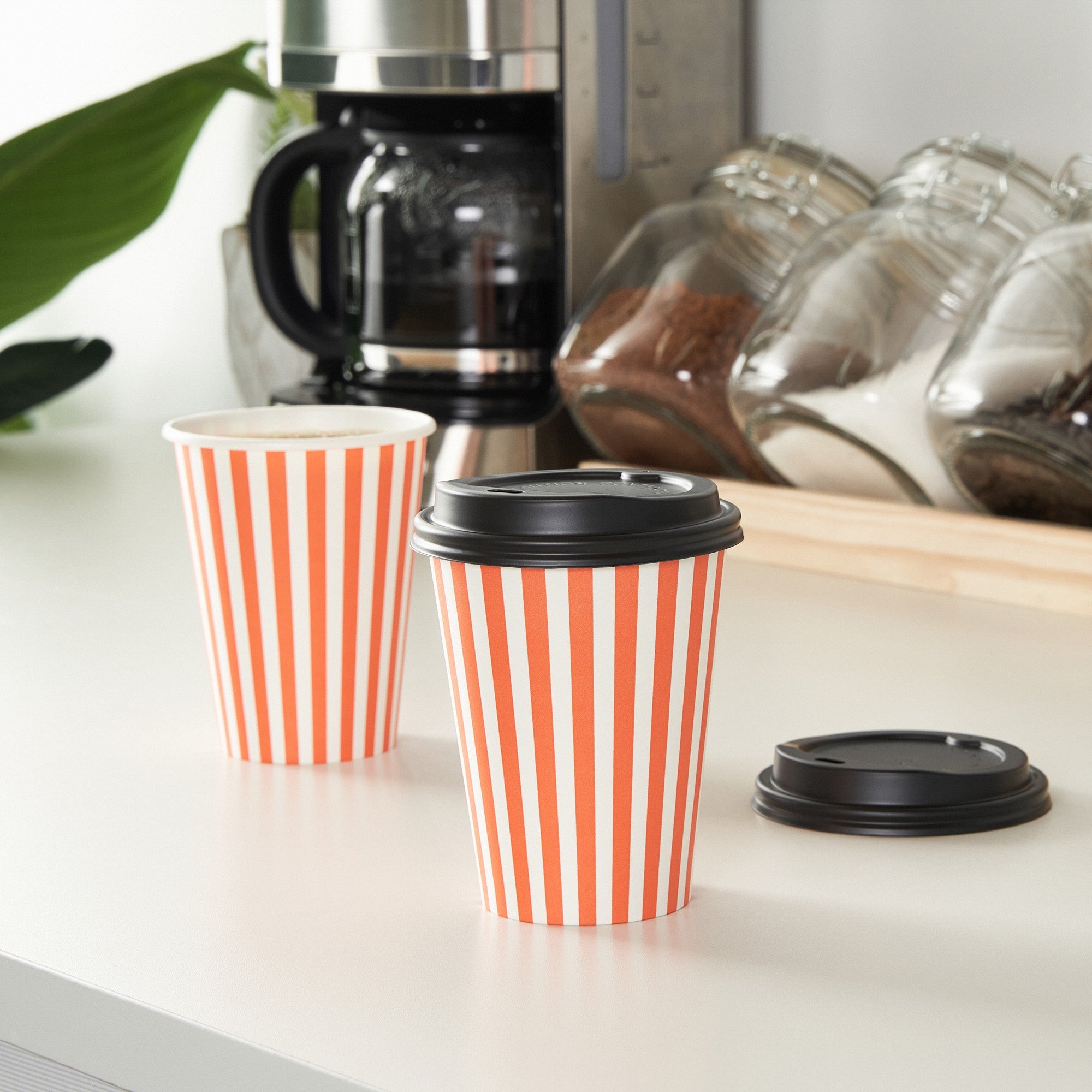 Restpresso 12 oz Orange and White Stripe Paper Single Wall Coffee Cup - with Black Lid - 3 1/2"x 3 1/2"x 4 1/4" - 20 count box