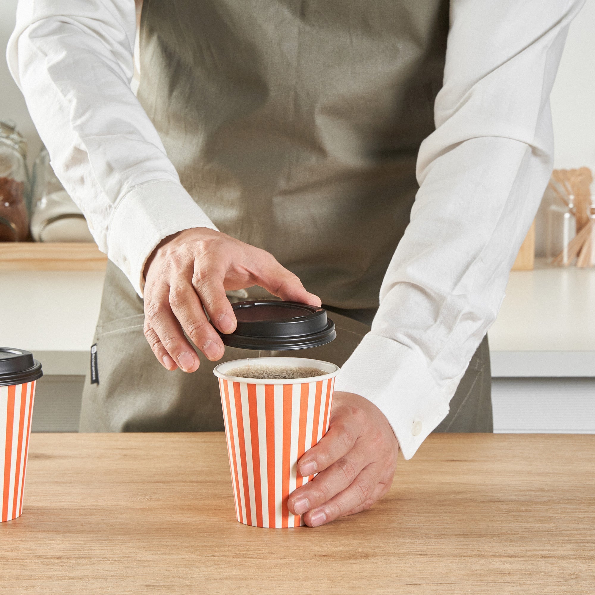 Restpresso 12 oz Orange and White Stripe Paper Single Wall Coffee Cup - with Black Lid - 3 1/2"x 3 1/2"x 4 1/4" - 400 count box