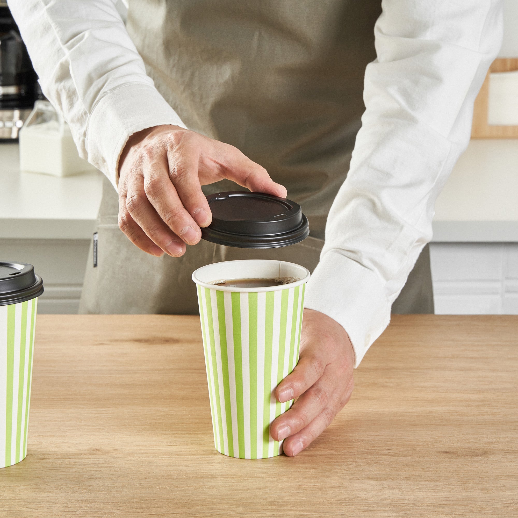 Restpresso 16 oz Green and White Stripe Paper Single Wall Coffee Cup - with Black Lid - 3 1/2"x 3 1/2"x 5 1/2" - 400 count box