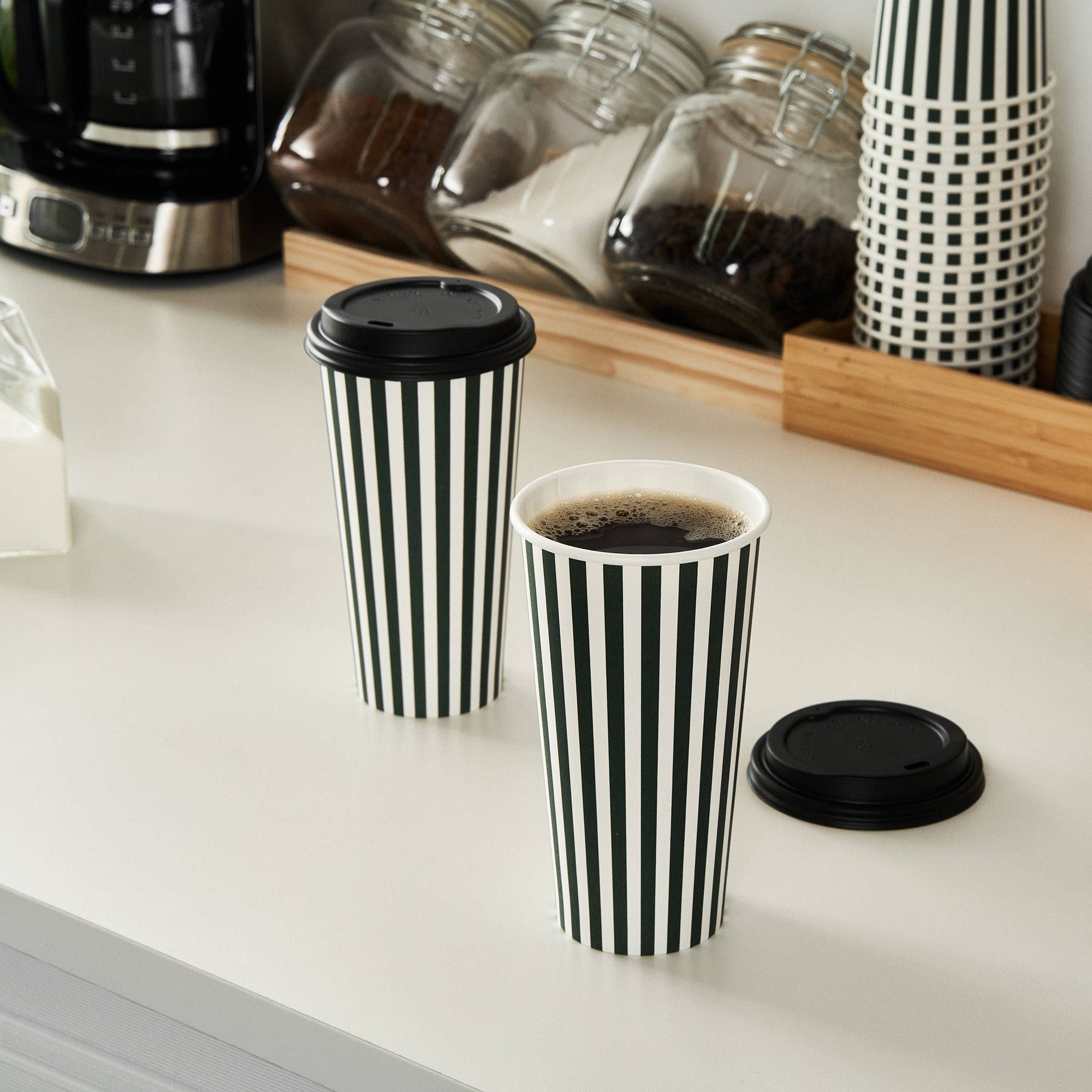 Restpresso 20 oz Forest Green and White Stripe Paper Single Wall Coffee Cup - with Black Lid - 3 1/2"x 3 1/2"x 6 1/4" - 20 count box