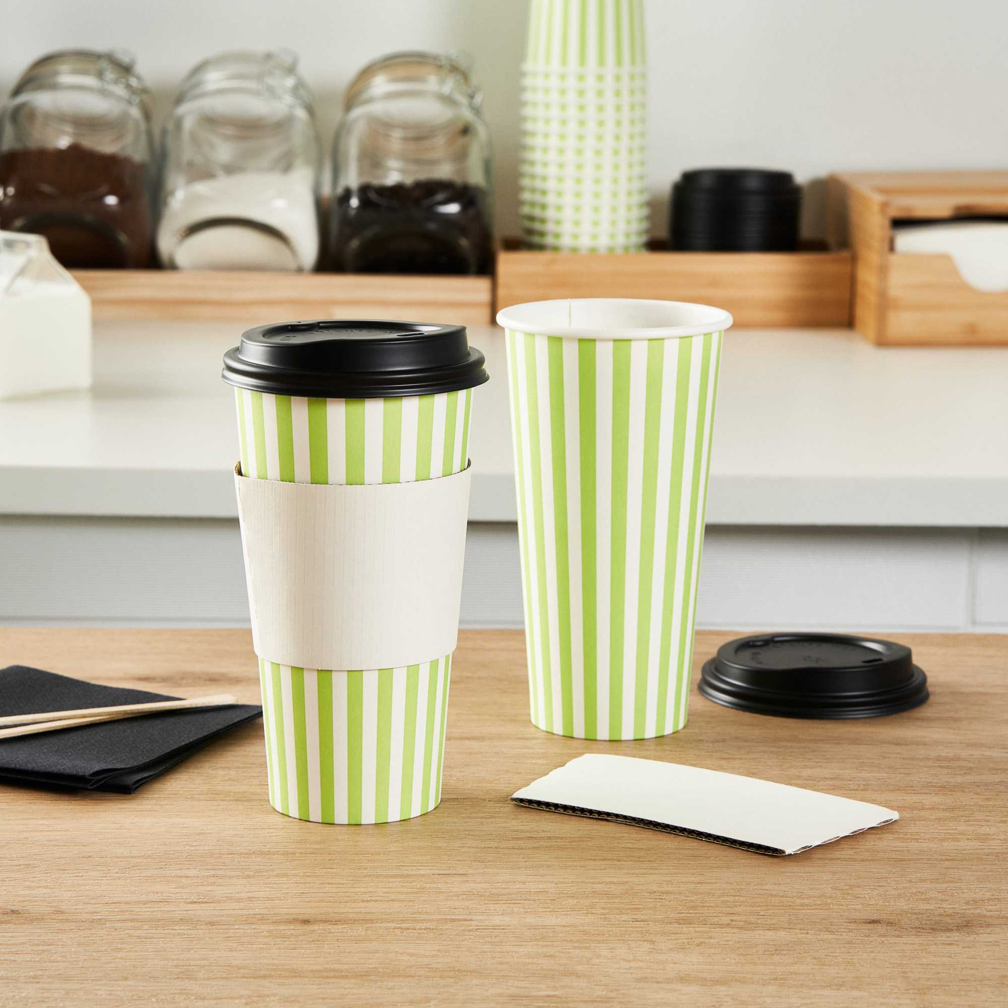 Restpresso 20 oz Green and White Stripe Paper Single Wall Coffee Cup - with Black Lid - 3 1/2"x 3 1/2"x 6 1/4" - 20 count box