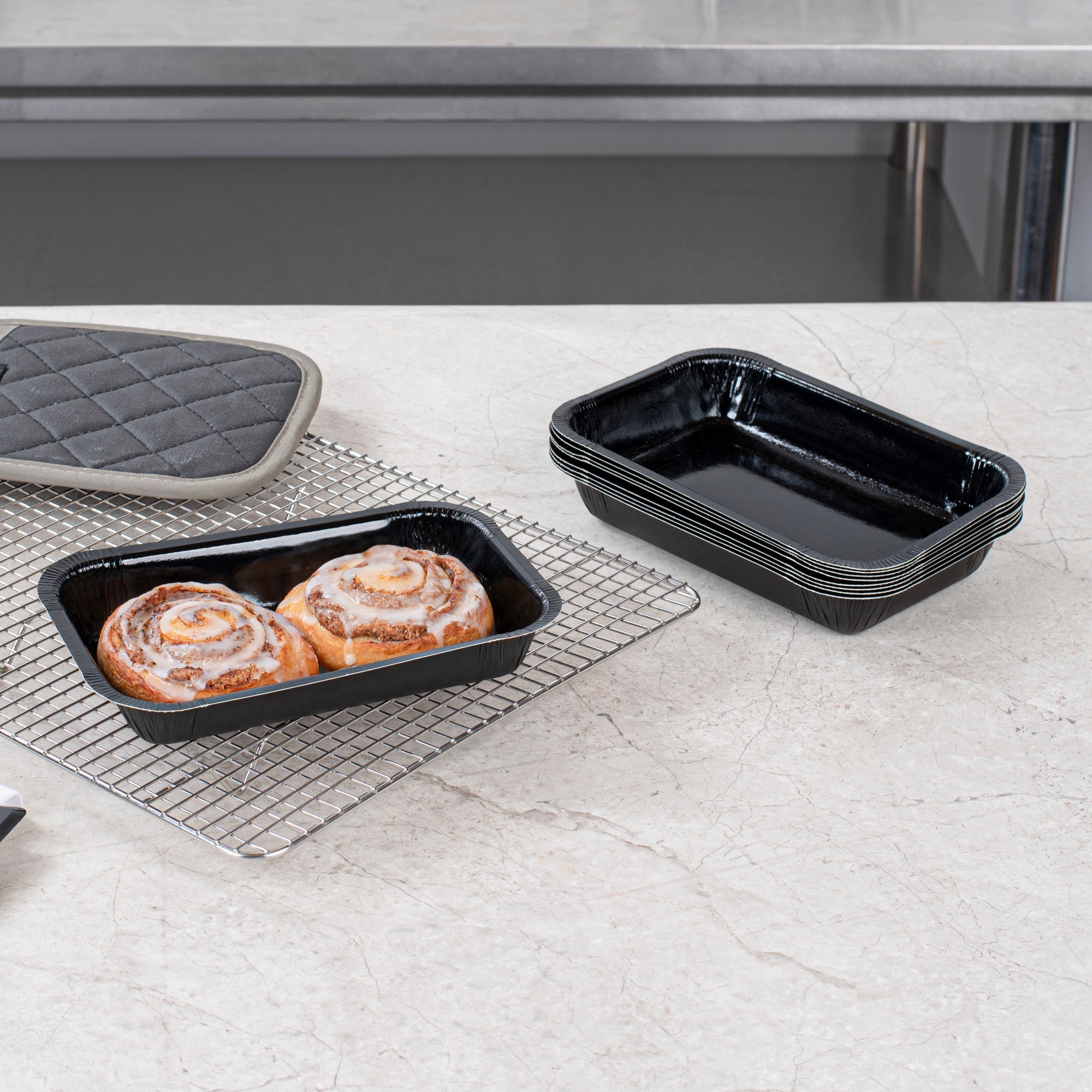Pastry Tek 24 oz Rectangle Black Paperboard Tray - Oven-Safe - 8 1/4" x 5 1/2" x 1 1/2" - 100 count box