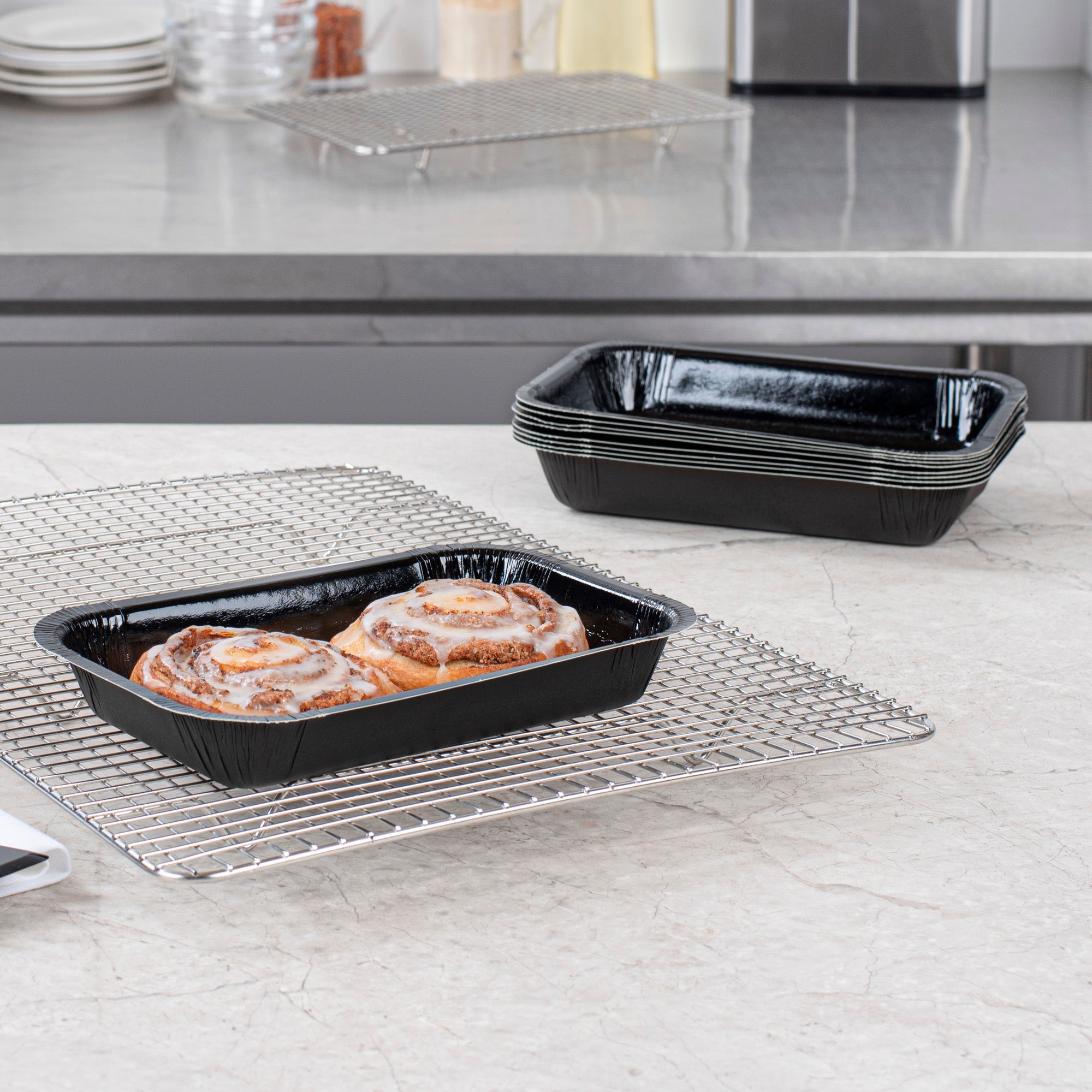 Pastry Tek 24 oz Rectangle Black Paperboard Tray - Oven-Safe - 8 1/4" x 5 1/2" x 1 1/2" - 100 count box