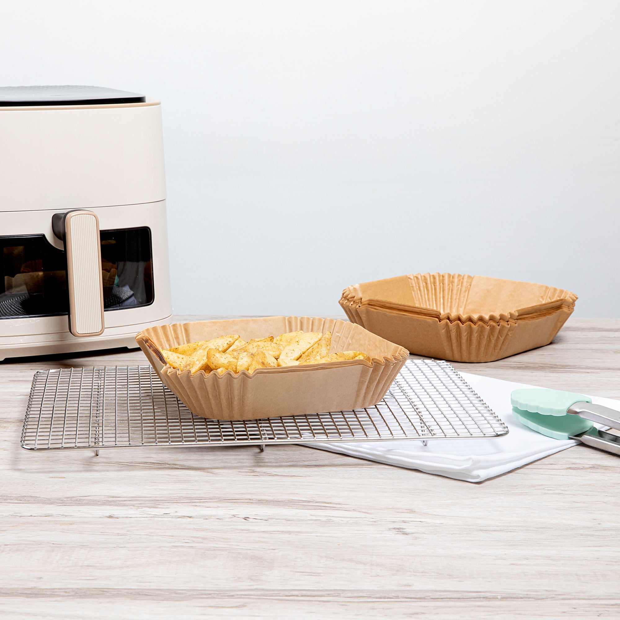 Pastry Tek Square Unbleached Air Fryer Liner / Parchment Paper - Silicone Coated - 6 1/4" x 6 1/4" x 1 3/4" - 100 count box