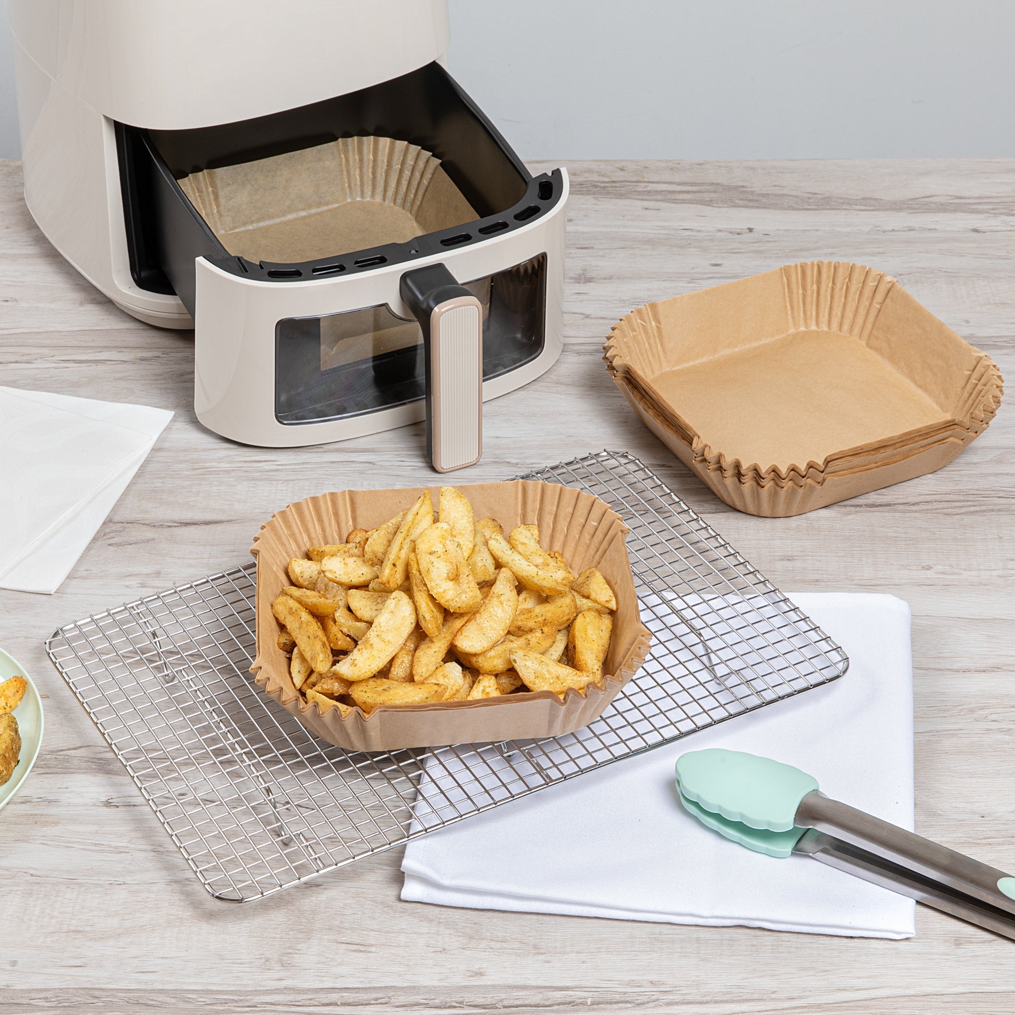 Pastry Tek Square Unbleached Air Fryer Liner / Parchment Paper - Silicone Coated - 6 1/4" x 6 1/4" x 1 3/4" - 100 count box