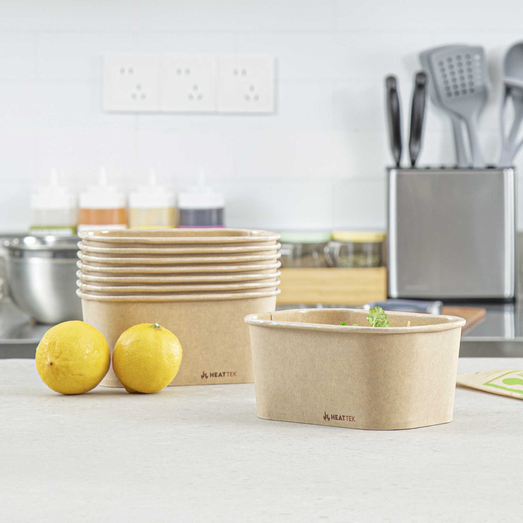 Heat Tek 34 oz Oval Kraft Paper Serving Container - Oven-Safe - 6 3/4" x 4 3/4" x 3" - 25 count box