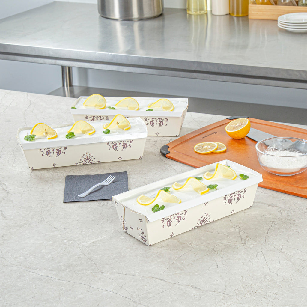 Bake Tek 42 oz Beige Vintage Floral Paper Baking Loaf Pan - Greaseproof - 10" x 3 1/2" x 2 1/2" - 100 count box