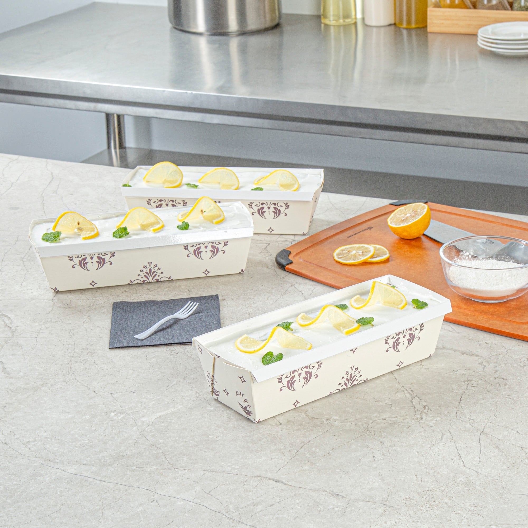 Bake Tek 42 oz Beige Vintage Floral Paper Baking Loaf Pan - Greaseproof - 10" x 3 1/2" x 2 1/2" - 100 count box