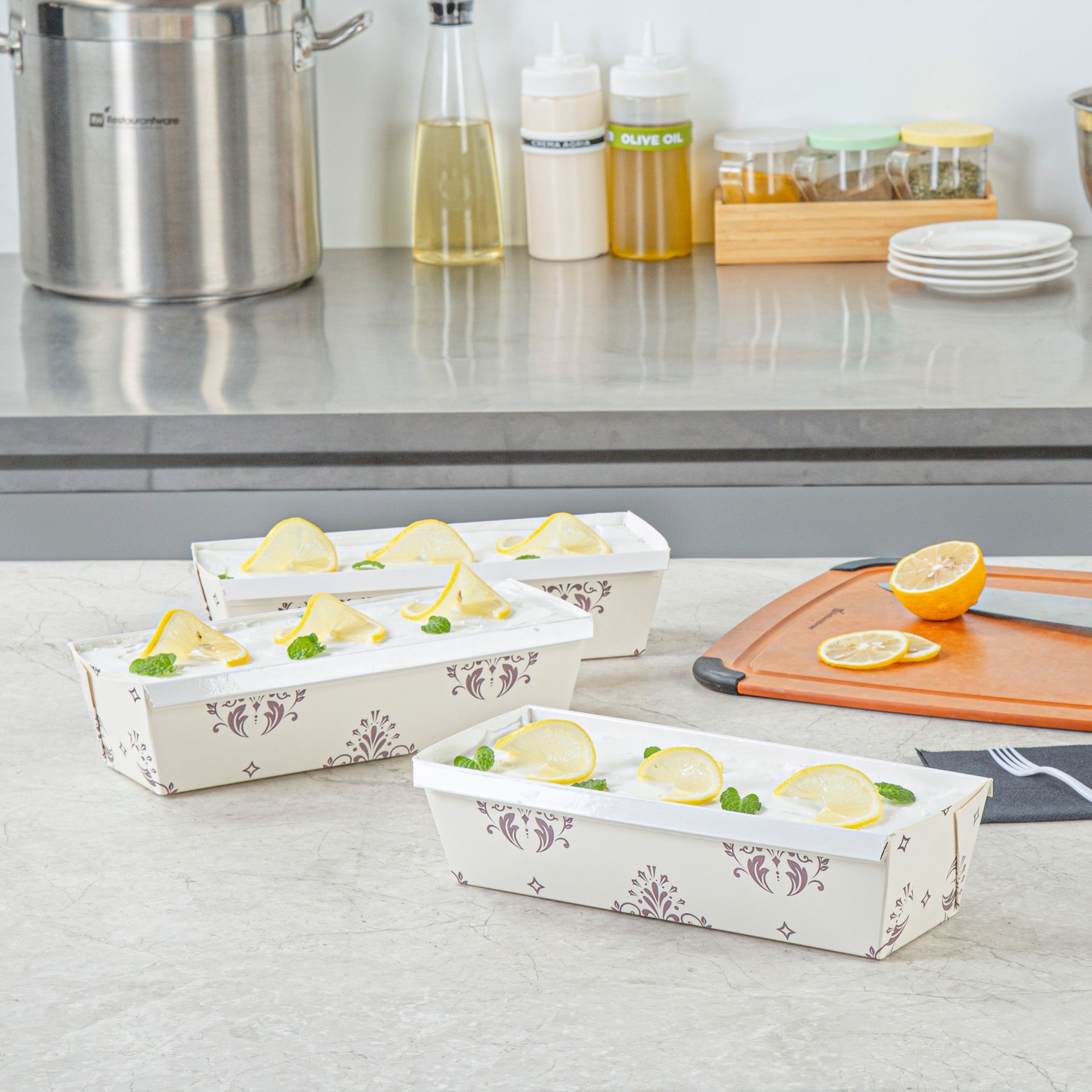 Bake Tek 42 oz Beige Vintage Floral Paper Baking Loaf Pan - Greaseproof - 10" x 3 1/2" x 2 1/2" - 100 count box