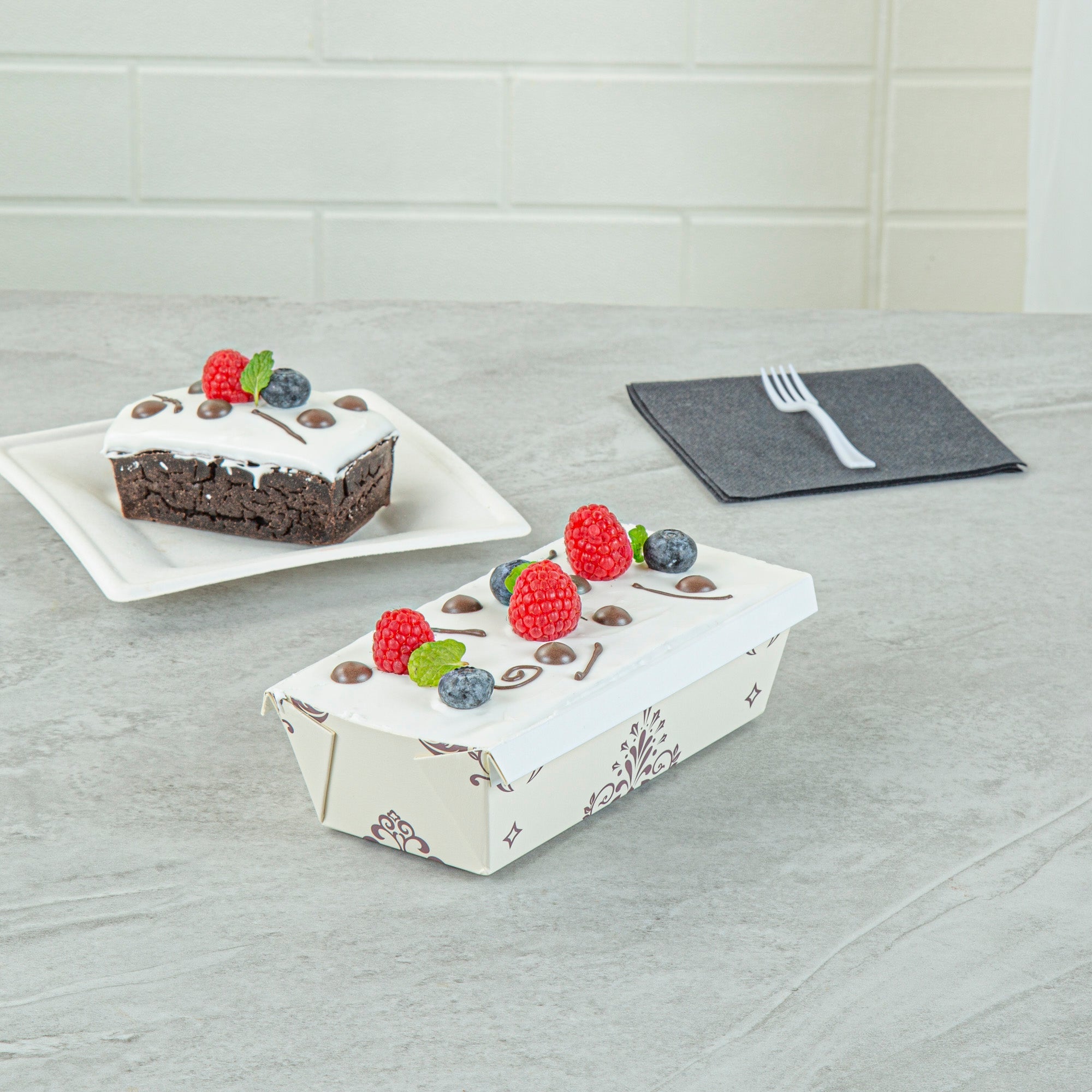 Bake Tek 13 oz Beige Vintage Floral Paper Baking Loaf Pan - Greaseproof - 7" x 3 1/4" x 2" - 100 count box