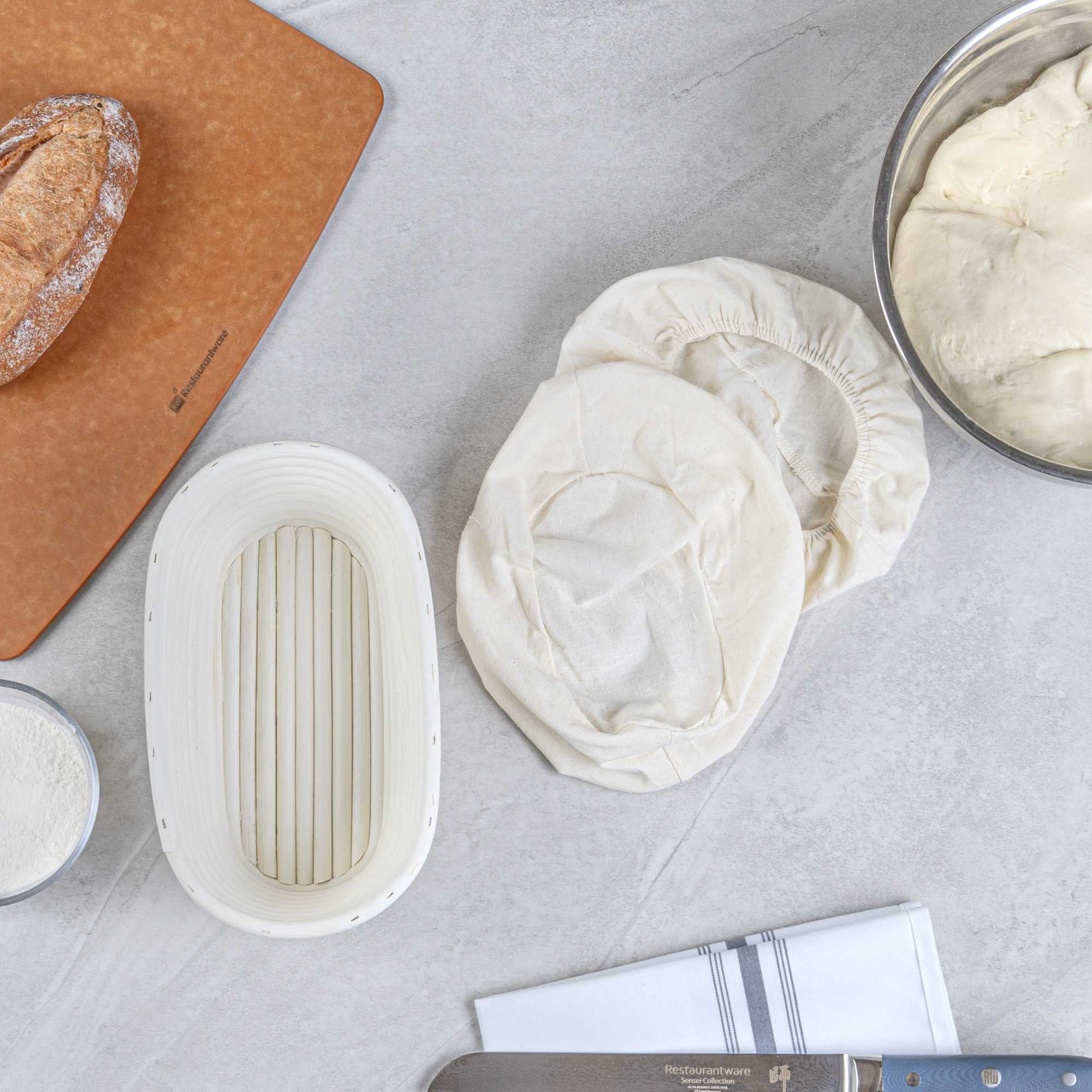 Pastry Tek Rattan Oval Natural Banneton Proofing Basket - with 2 Cotton Liners - 9 3/4" x 6" x 3" - 10 count box