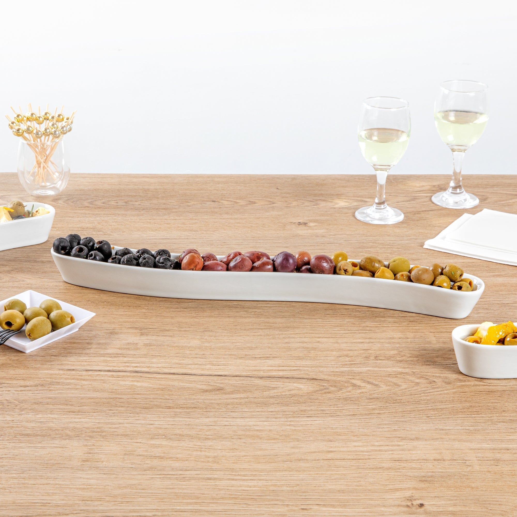 Chef 101 Swerve 14 oz Curved White Porcelain Olive Plate - 17" x 2 1/2" x 1 1/4" - 1 count box