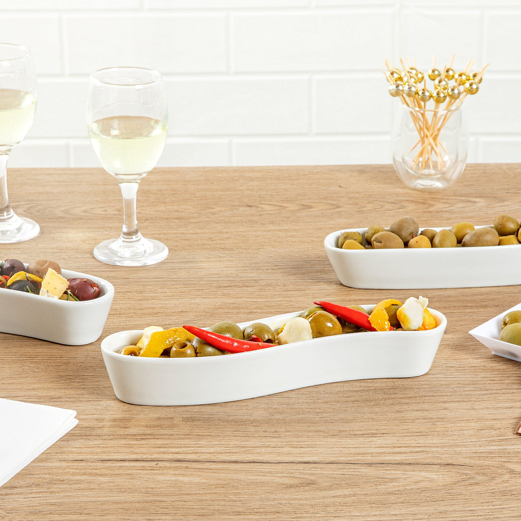 Chef 101 Swerve 6 oz Curved White Porcelain Olive Plate - 8 3/4" x 2 1/4" x 1 1/2" - 1 count box