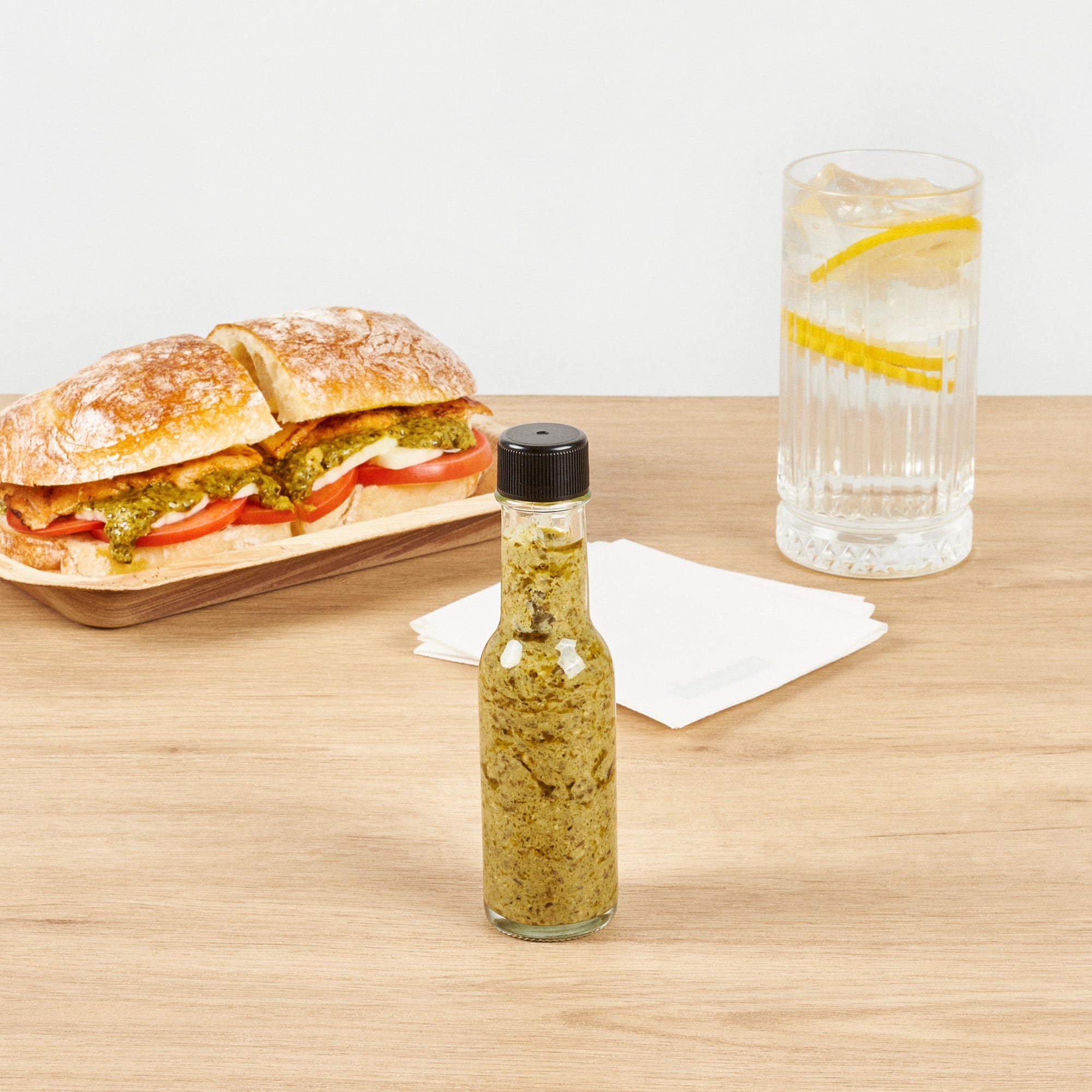 Vetri 3 oz Glass Woozy Bottle - with Black Cap - 1 1/2" x 1 1/2" x 6" - 10 count box