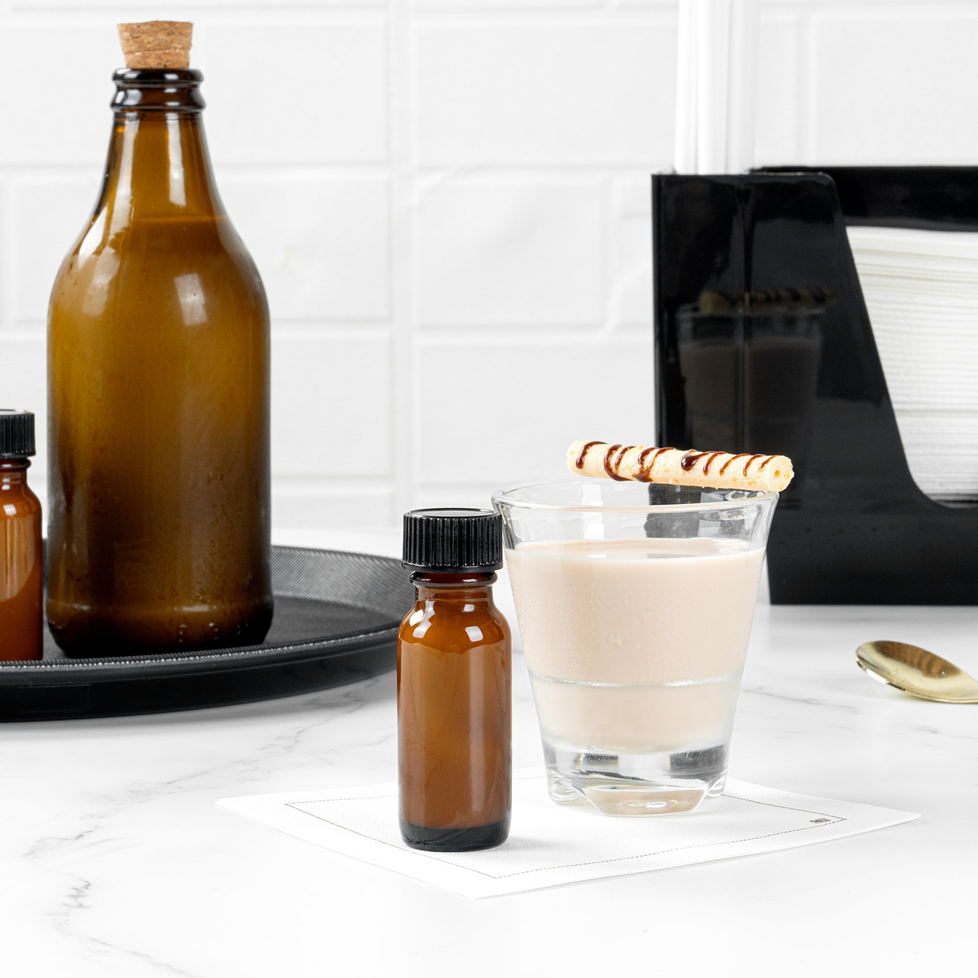 Vetri 0.5 oz Boston Round Amber Glass Bottle - with Black Phenolic Cap - 1" x 1" x 2 3/4" - 48 count box