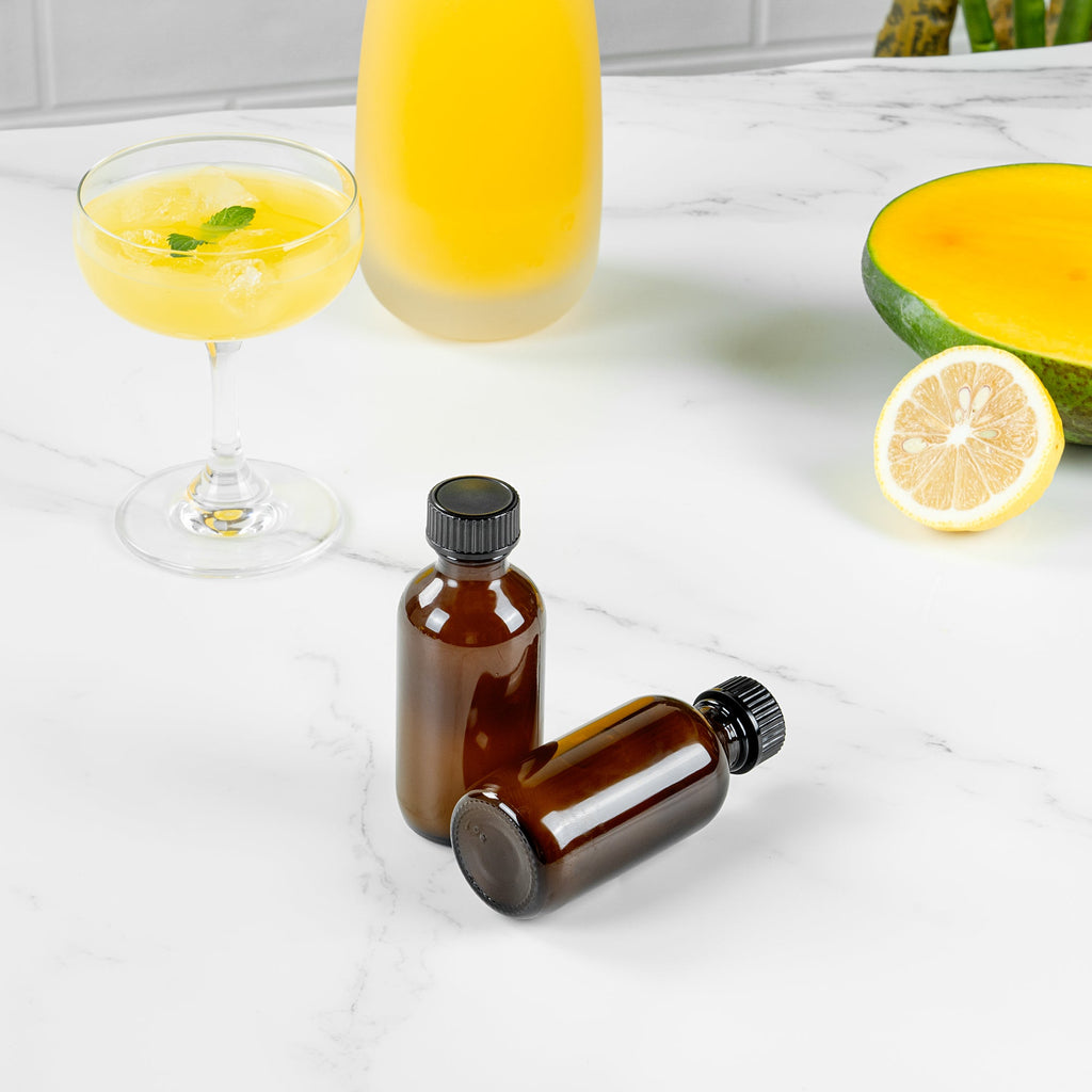 Vetri 2 oz Boston Round Amber Glass Bottle - with Black Phenolic Cap - 1 1/2" x 1 1/2" x 3 3/4" - 48 count box