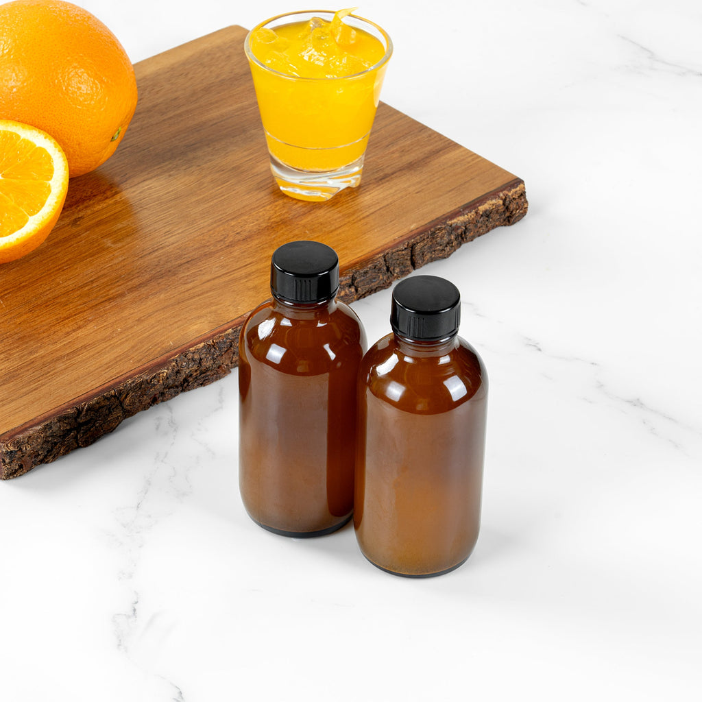 Vetri 4 oz Boston Round Amber Glass Bottle - with Black Phenolic Cap - 2" x 2" x 4 1/2" - 24 count box