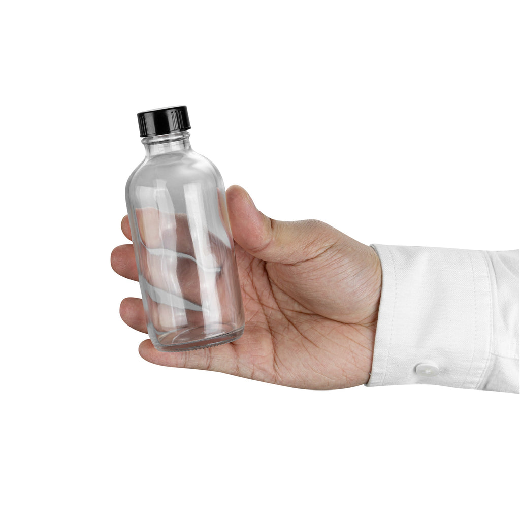 Vetri 4 oz Boston Round Clear Glass Bottle - with Black Phenolic Cap - 2" x 2" x 4 1/2" - 24 count box