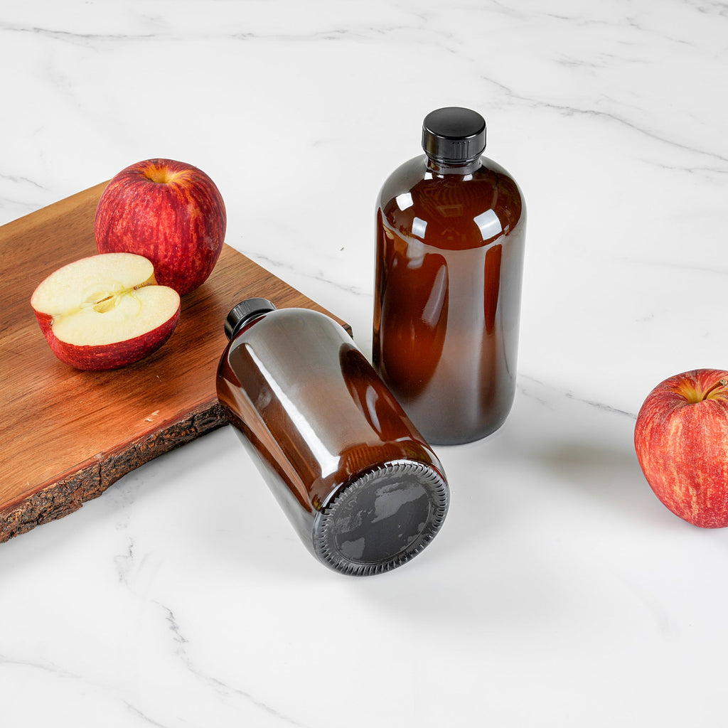 Vetri 16 oz Boston Round Amber Glass Bottle - with Black Phenolic Cap - 3" x 3" x 6 3/4" - 12 count box