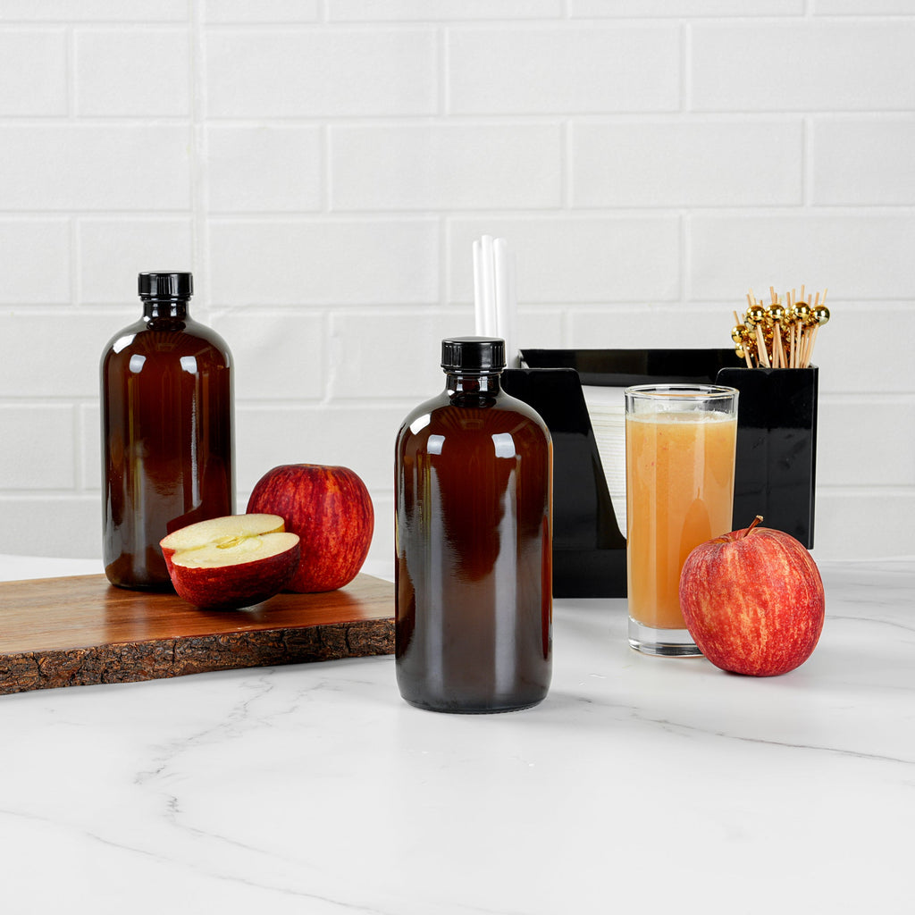 Vetri 16 oz Boston Round Amber Glass Bottle - with Black Phenolic Cap - 3" x 3" x 6 3/4" - 12 count box
