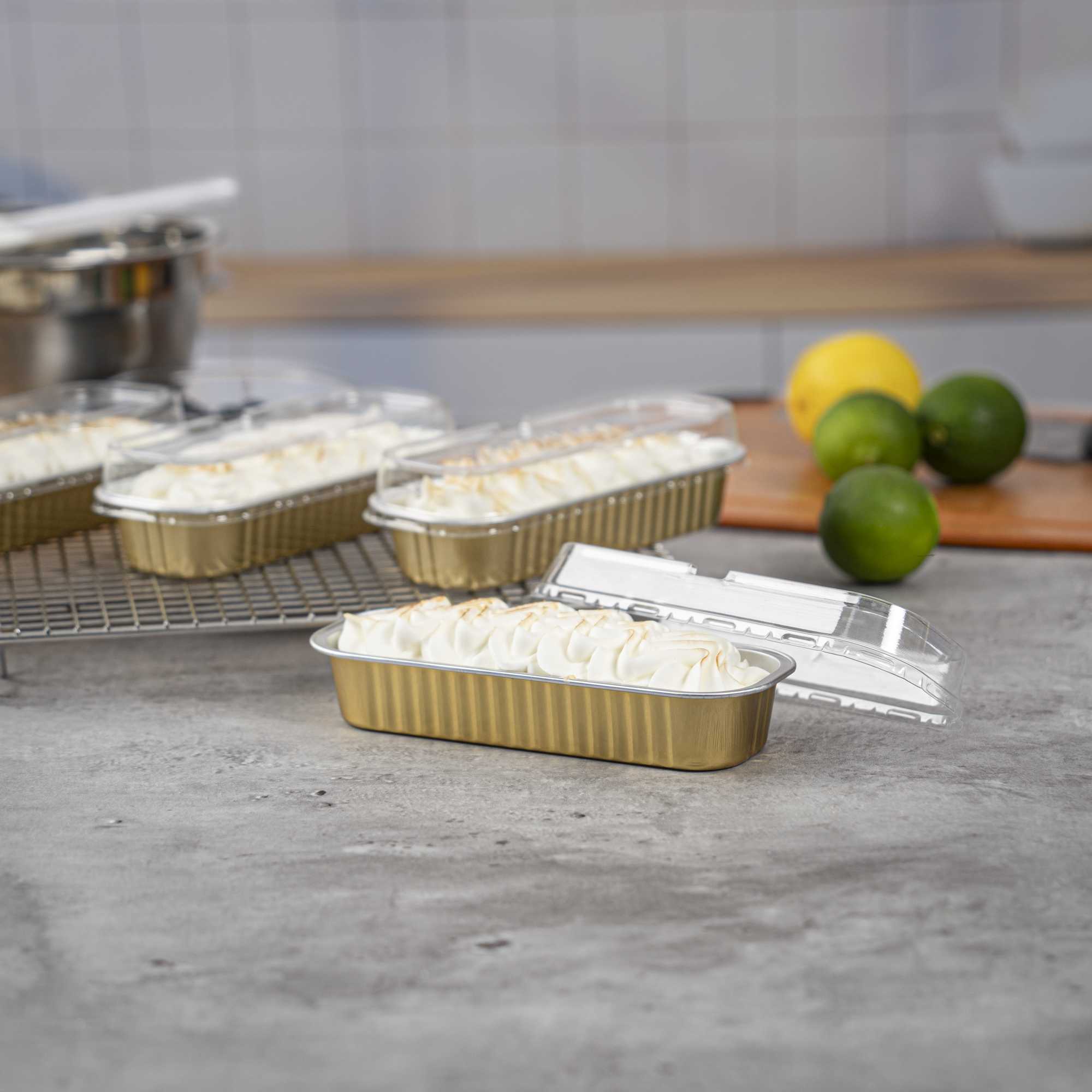 7 oz Rectangle Gold Aluminum Baking Loaf Pan - with Plastic Dome Lid - 6 1/2" x 2 1/2" x 1 1/4" - 100 count box