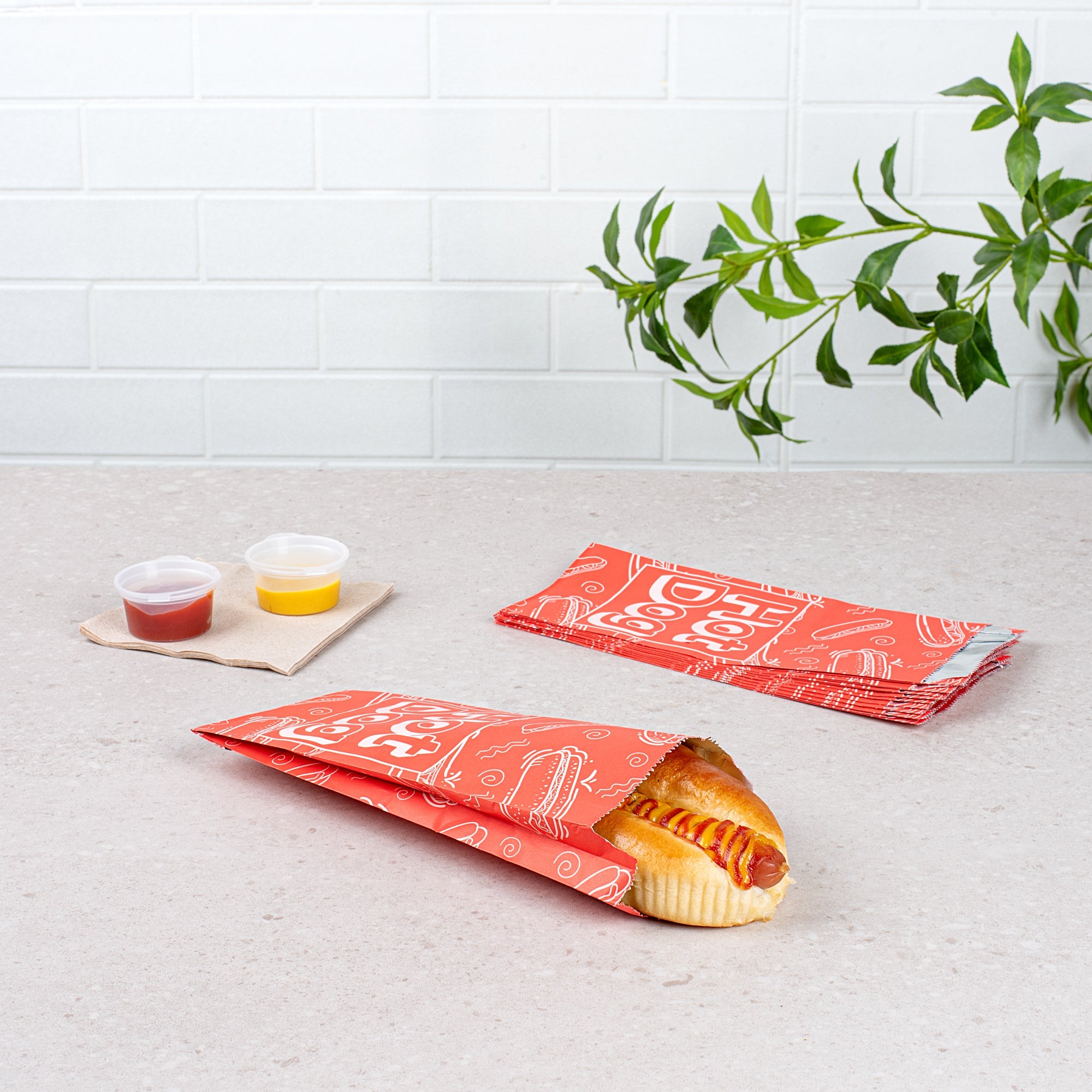 Bag Tek Red Paper Printed Small Hot Dog Foil Bag - 3 3/4" x 1 1/4" x 9" - 100 count box