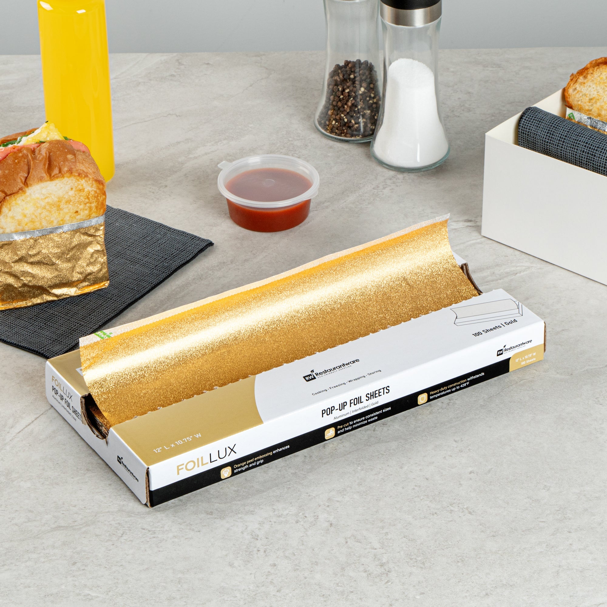 Foil Lux Foodservice Gold Aluminum Foil Pop-Up Sheet - Interfolded, Embossed - 12" x 10 3/4" - 100 count box