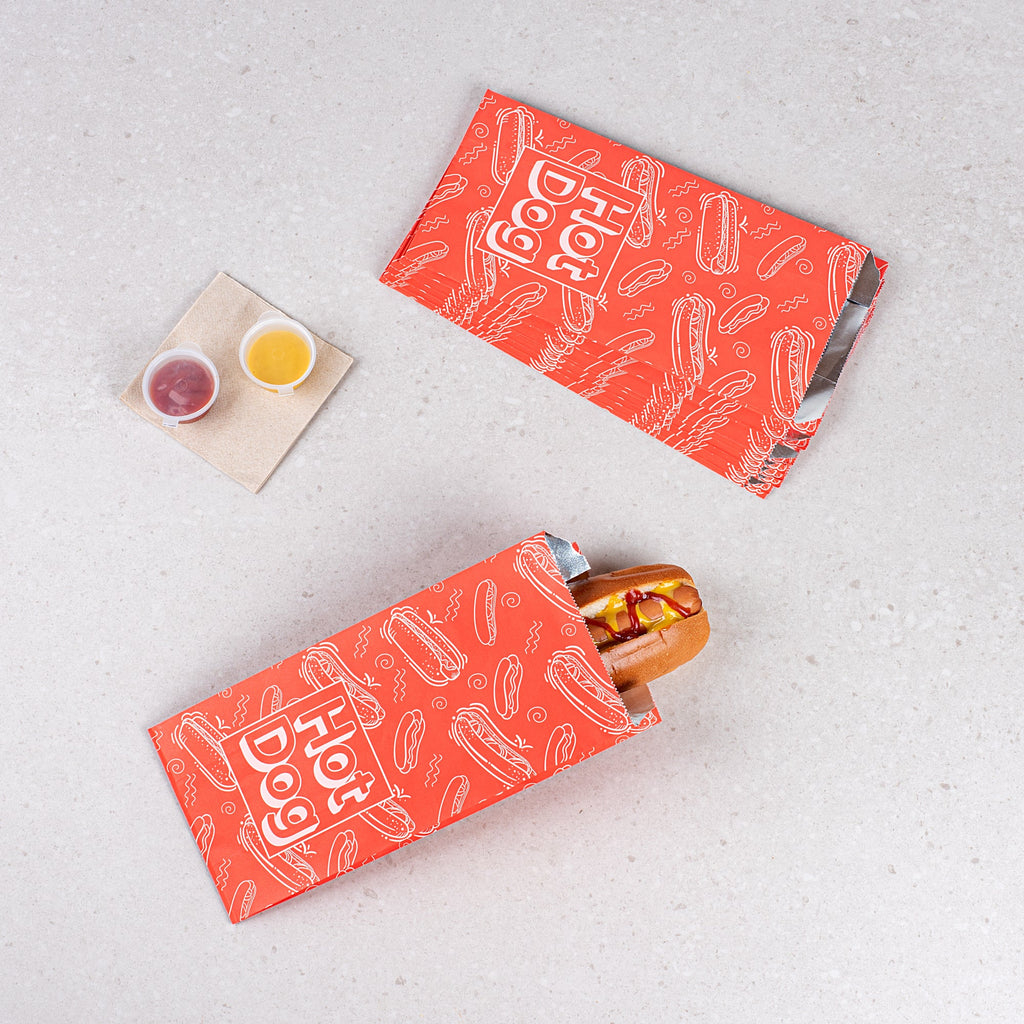 Bag Tek Red Paper Printed Hot Dog Foil Bag - Qt. Size - 5 1/2" x 3 1/4" x 12" - 100 count box