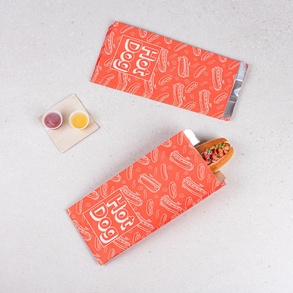 Bag Tek Red Paper Printed Hot Dog Foil Bag - 1/2 Gallon - 4 1/4" x 6 1/2" x 14 1/2" - 100 count box