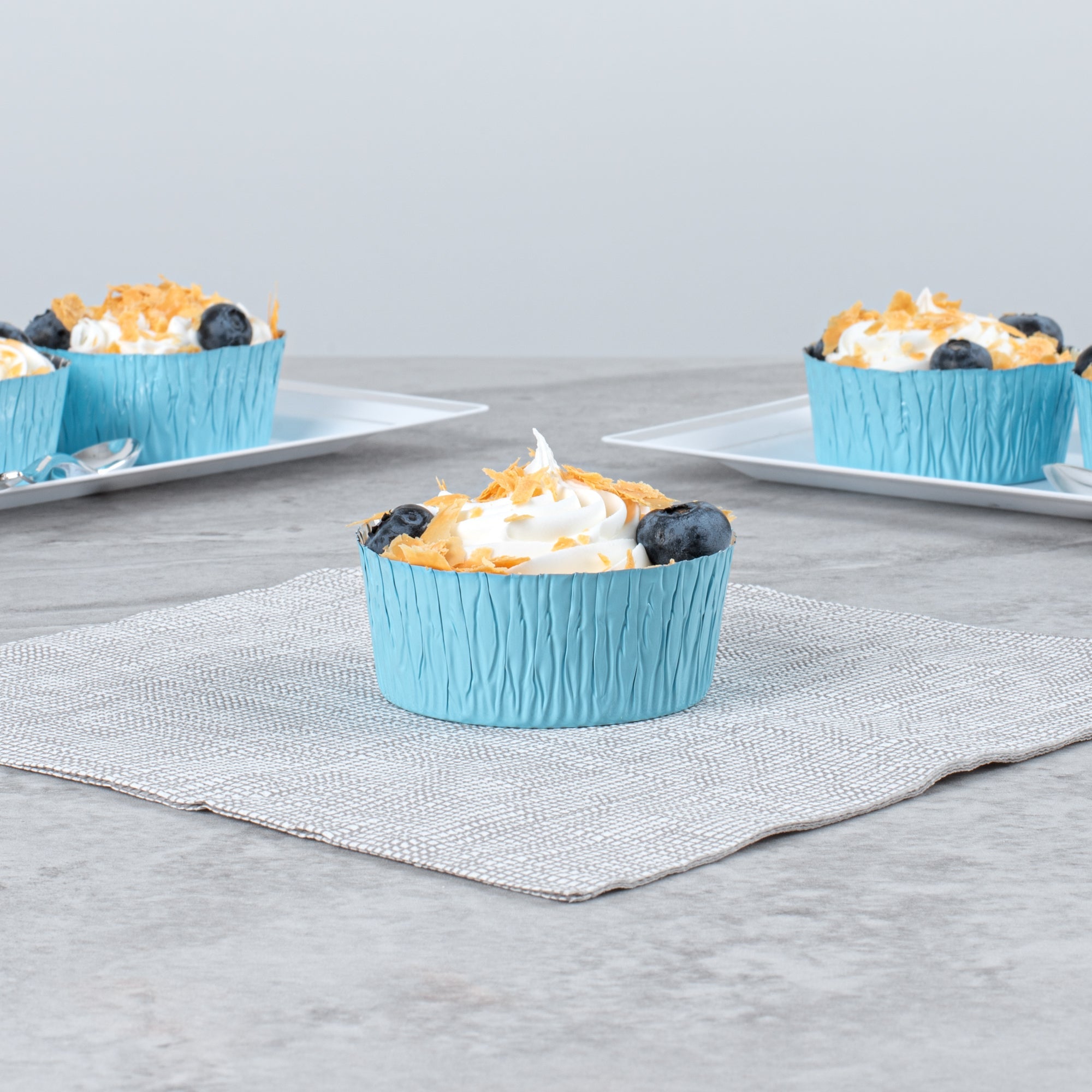 Pastry Tek 3 oz Round Blue Foil Ramekin Cup - 3/4" x 3/4" x 1/2" - 200 count box