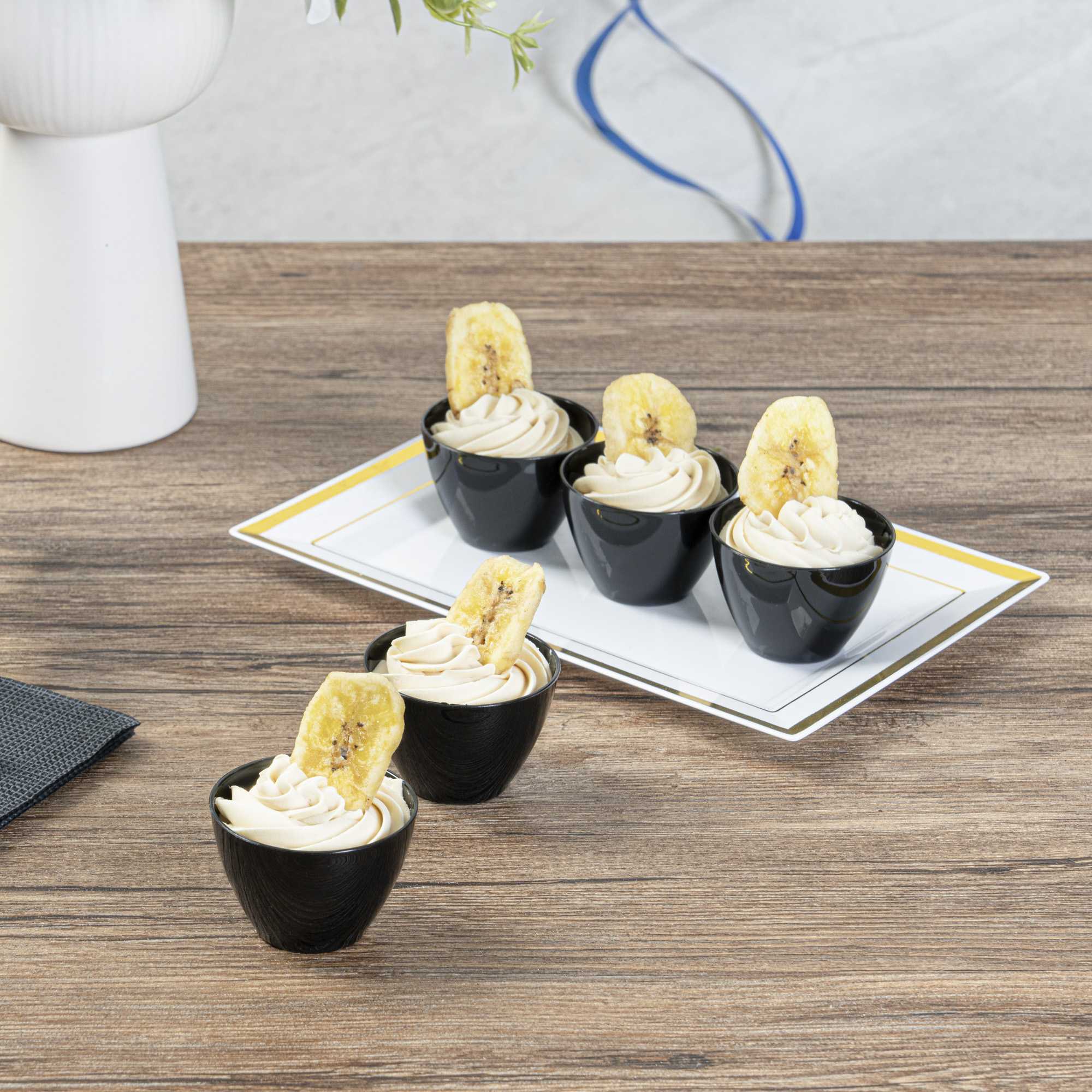Mini Serve 2 oz Round Black Plastic Mini Tasting Bowl - 2" x 2" x 1 1/2" - 100 count box