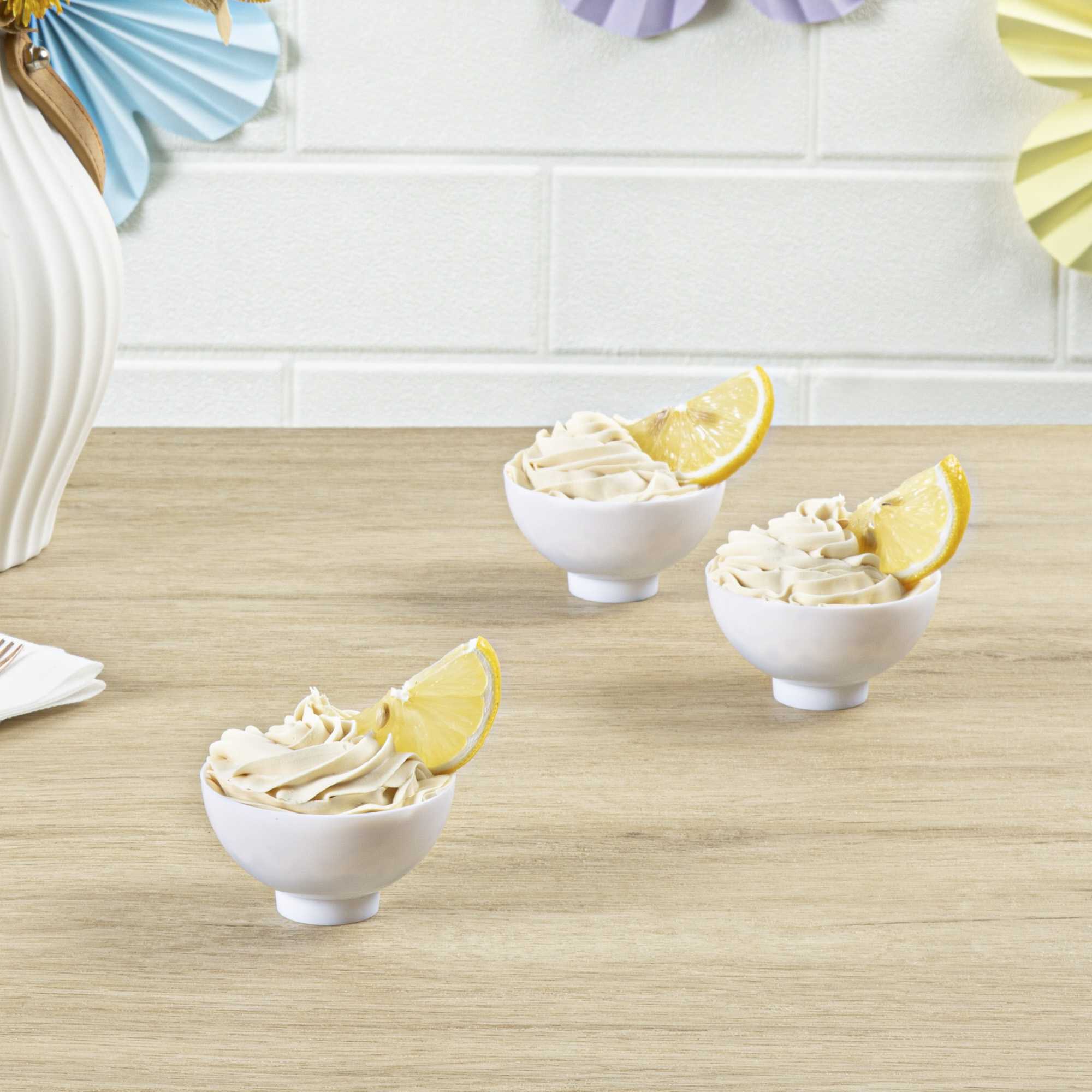 Mini Serve 2 oz Round White Plastic Coppa Bowl - 2 1/2" x 2 1/2" x 1" - 100 count box