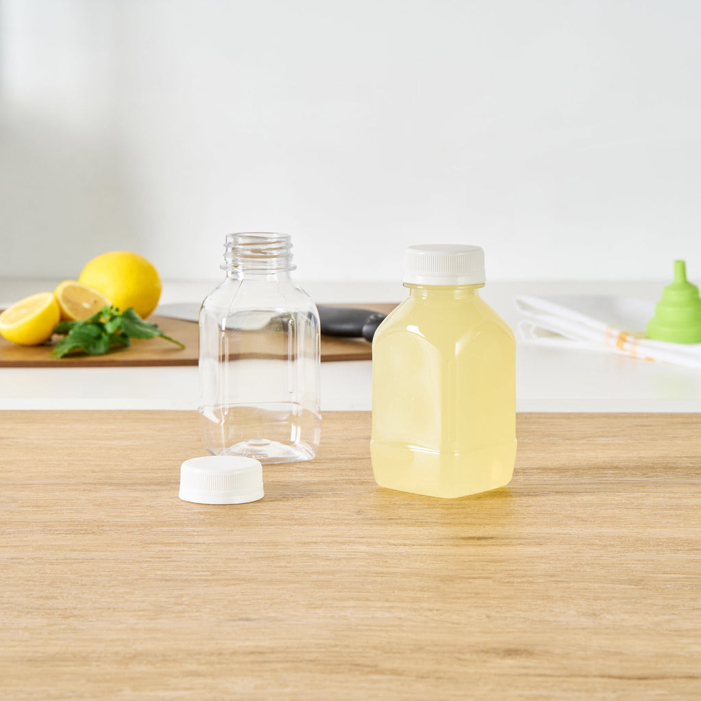 Bottle Tek 8 oz Square Clear Plastic Cold Pressed Juice Bottle - with Safety Cap - 2 1/4" x 2 1/4" x 4 3/4" - 100 count box